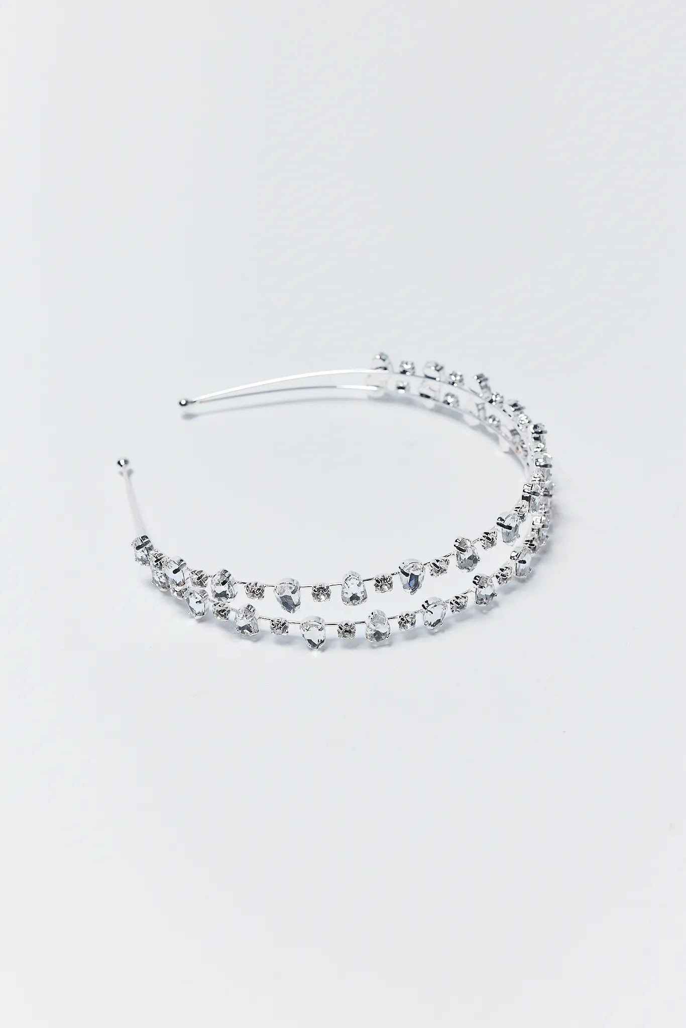 Anne Rhinestone Headband with small crystals on a light gray background