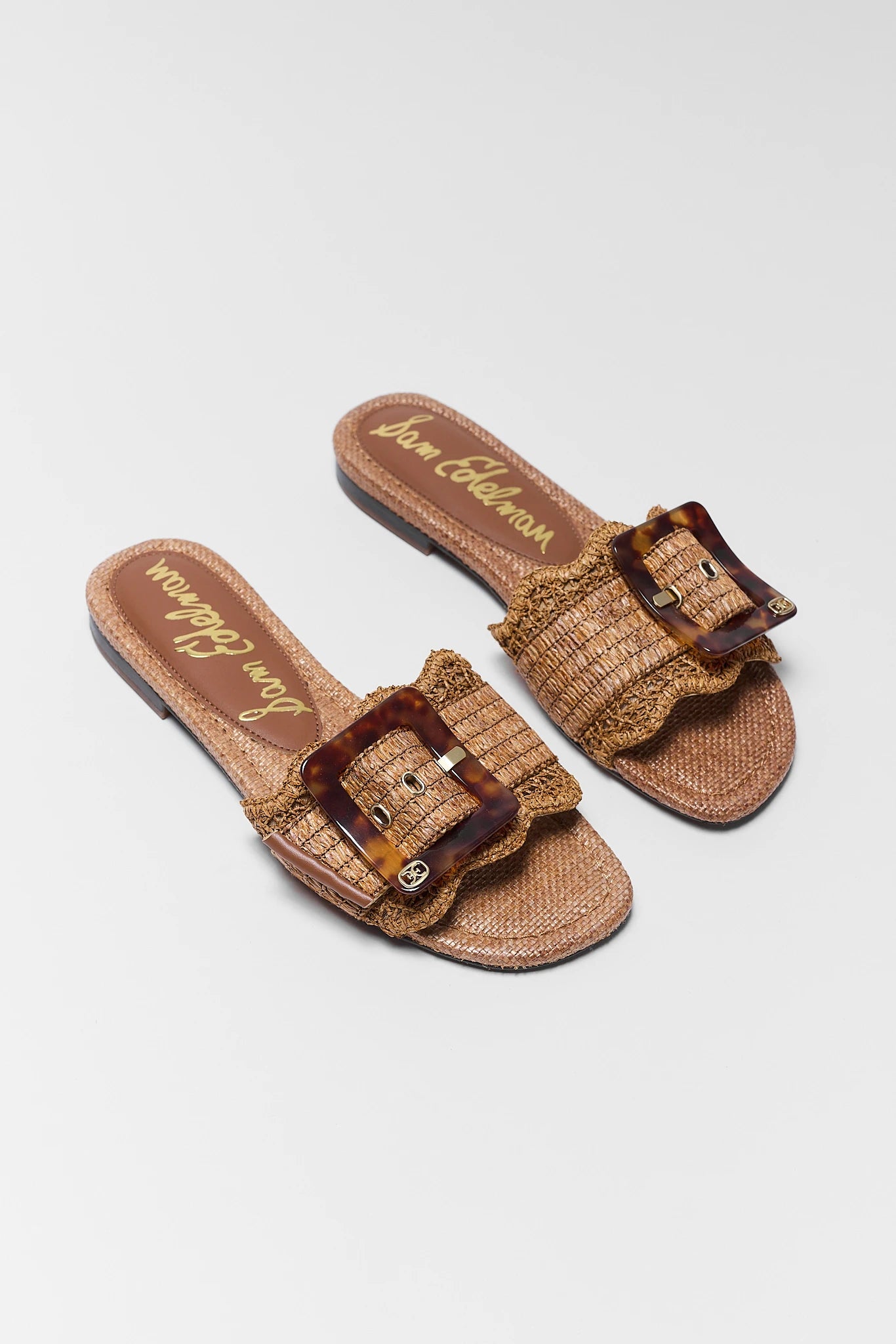 two Bambi Tan Woven Buckle Sandals on white background