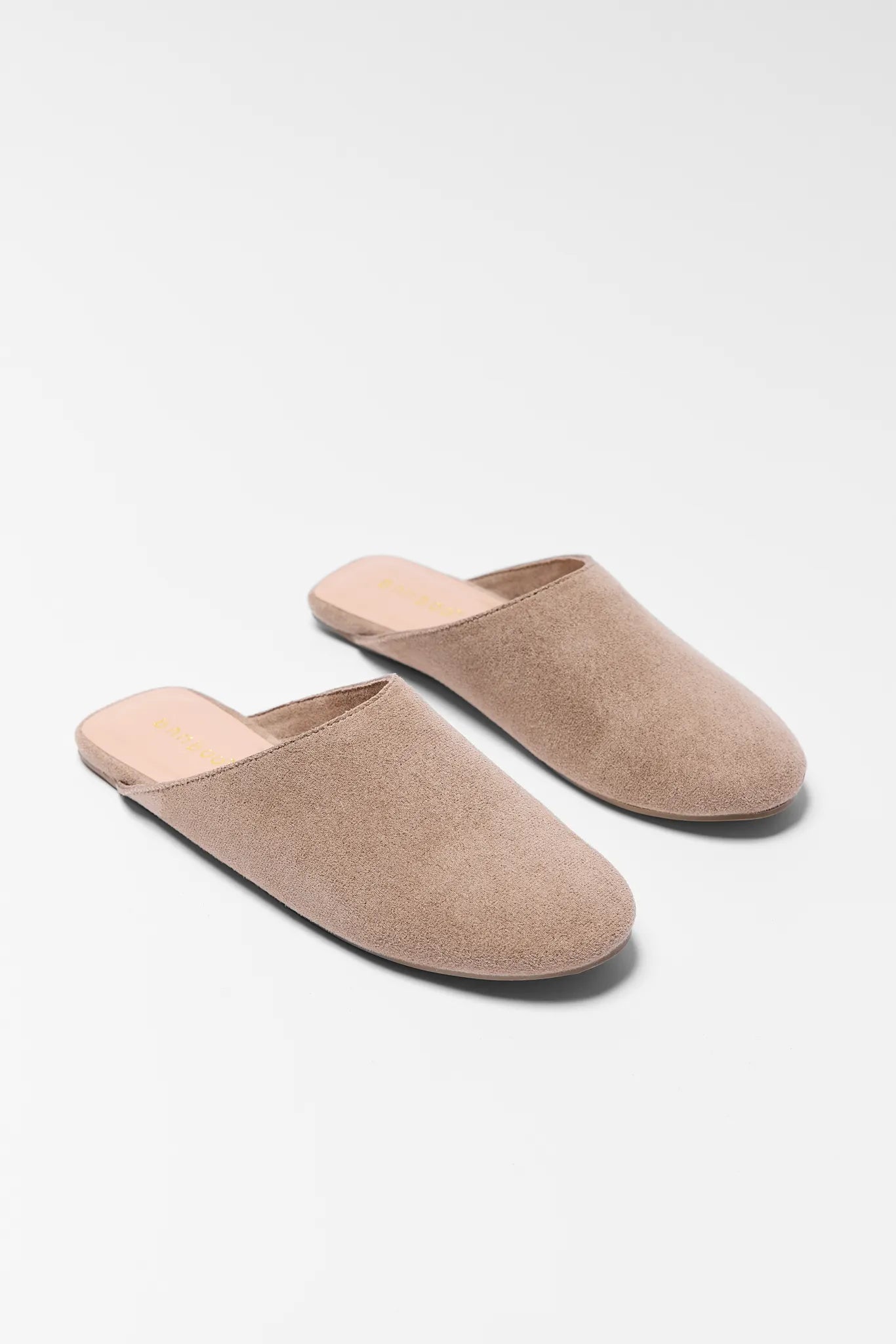Pair of brown slippers on a white background Faith Tan Faux Suede Mules