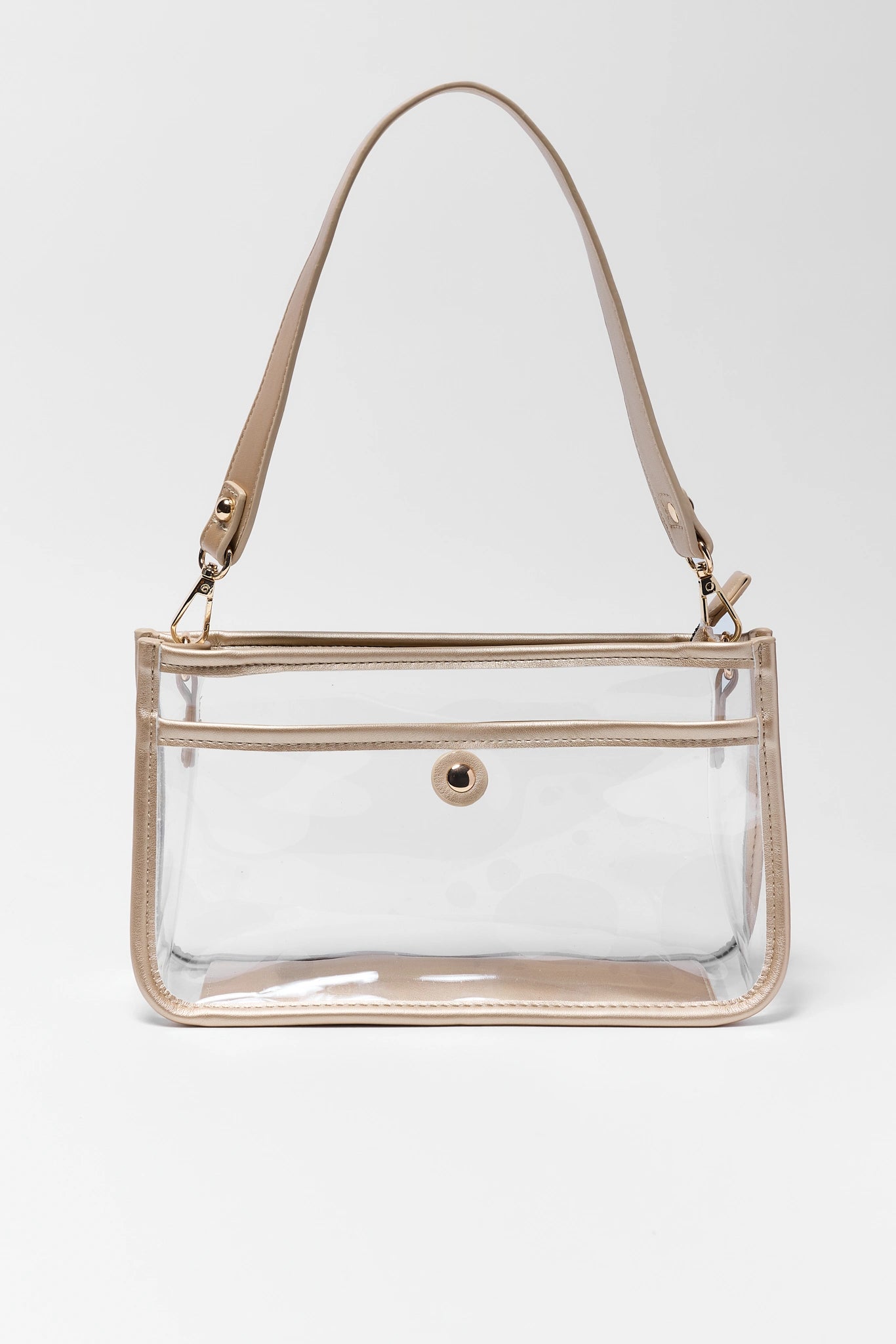 A clear plastic handbag with a beige shoulder strap and trim, featuring a front zippered pocket and a gold-tone snap button closure, set against a plain light gray background.