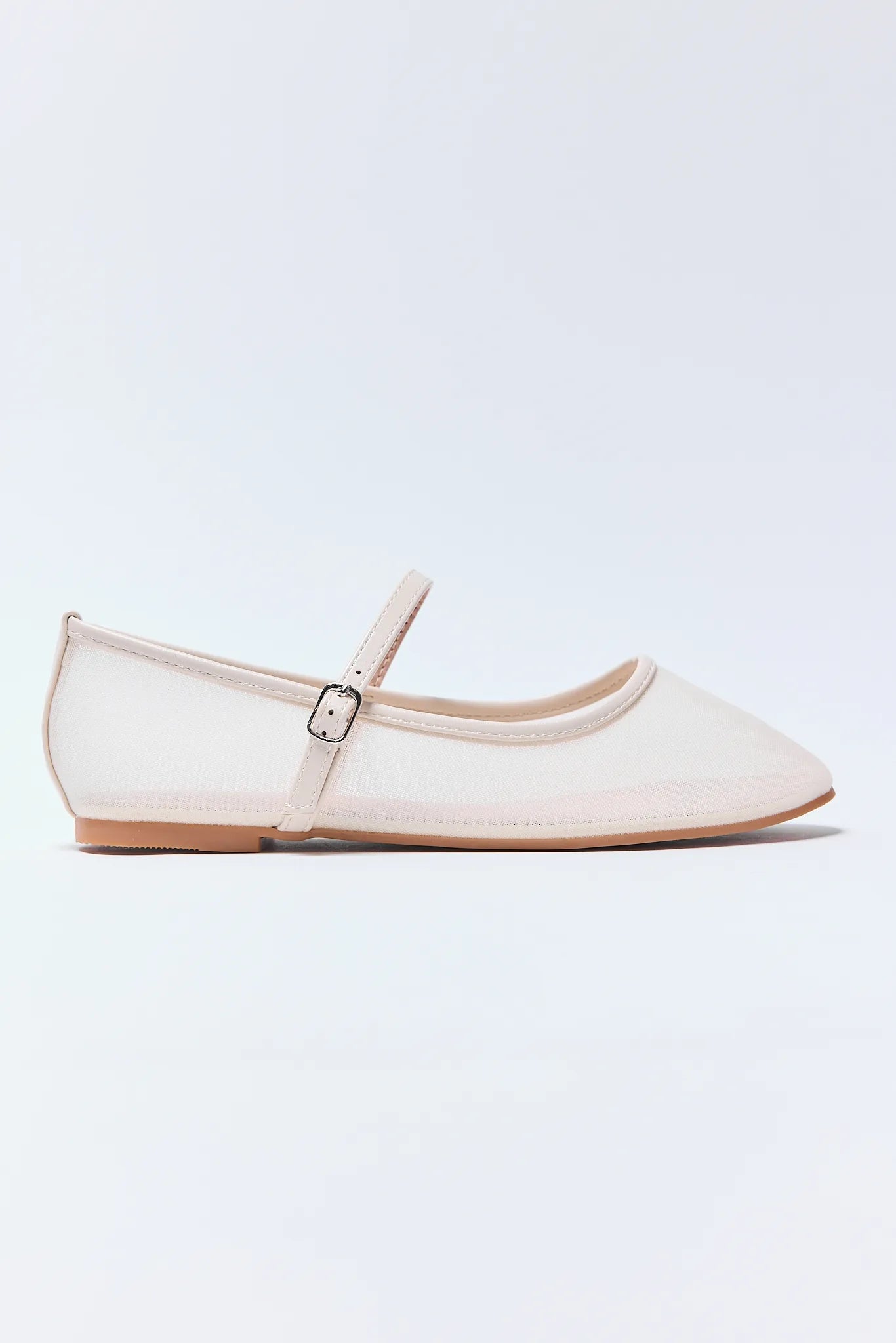 Beige flat Jane Flats with a strap on a light gray background