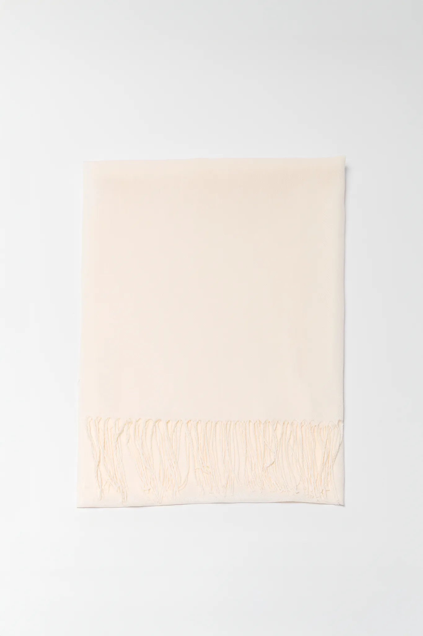 Beige towel on a white background