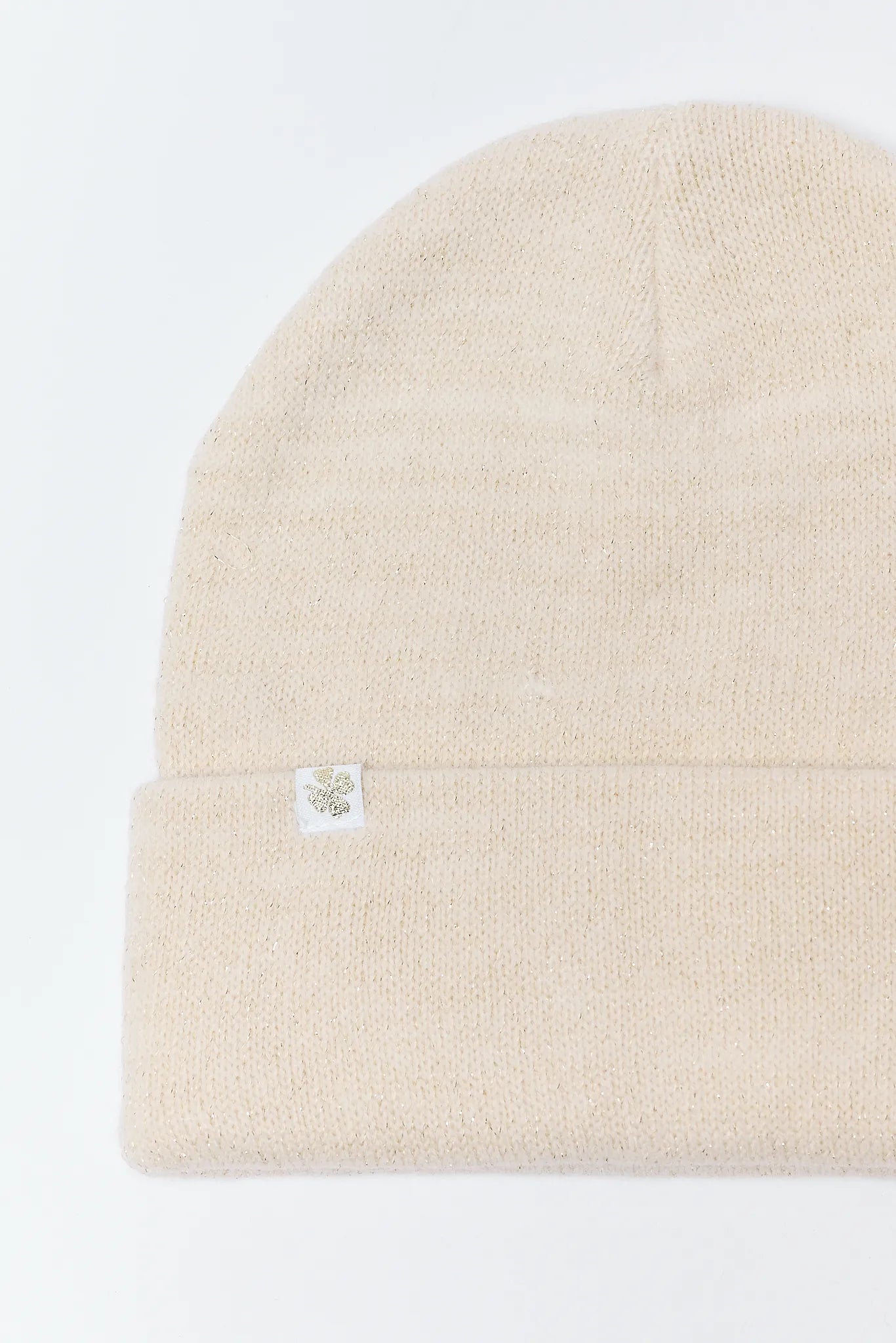 Karsyn Knit Foldover Beanie with a small label on a white background
