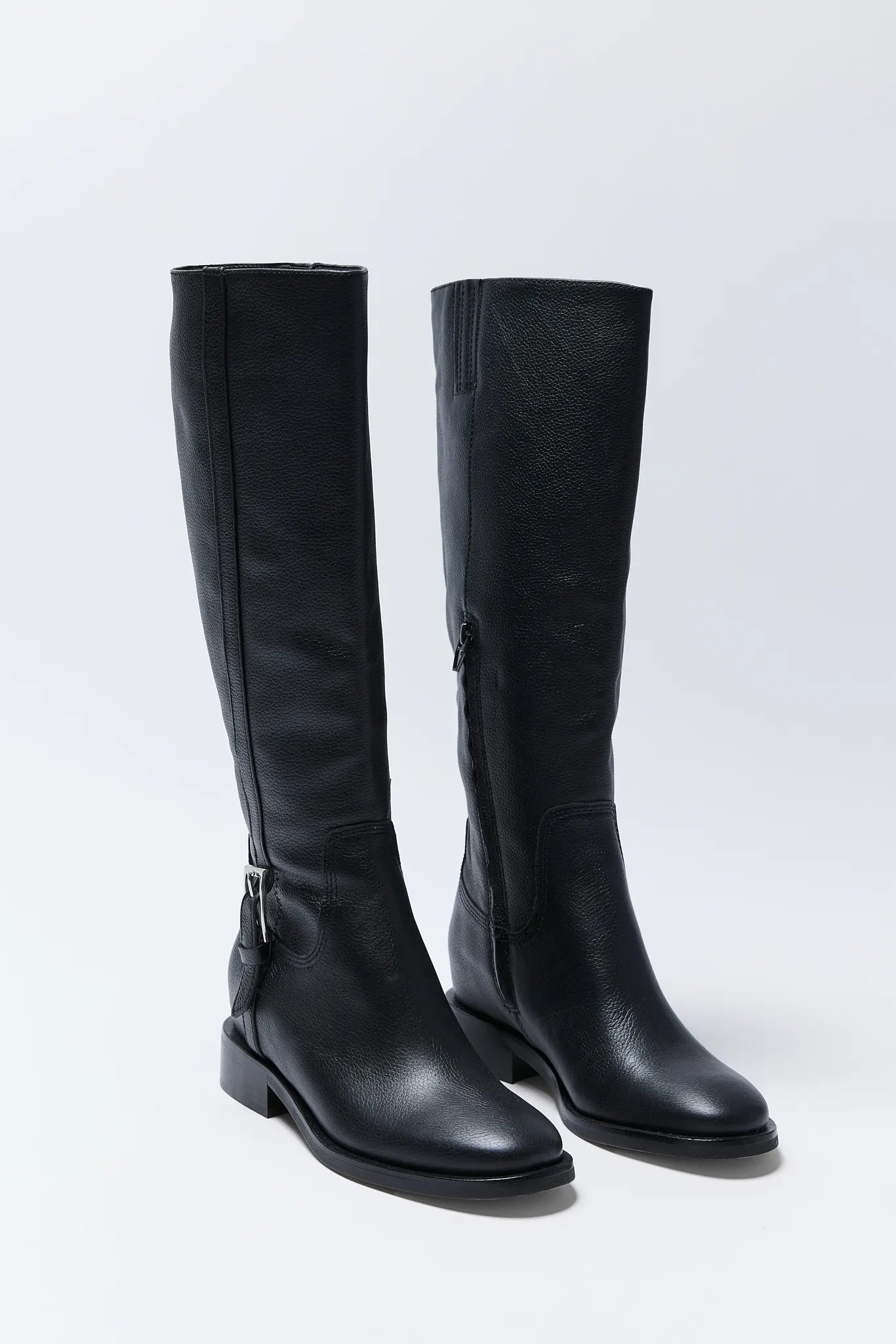 Pair of black Kilian Boots on a white background