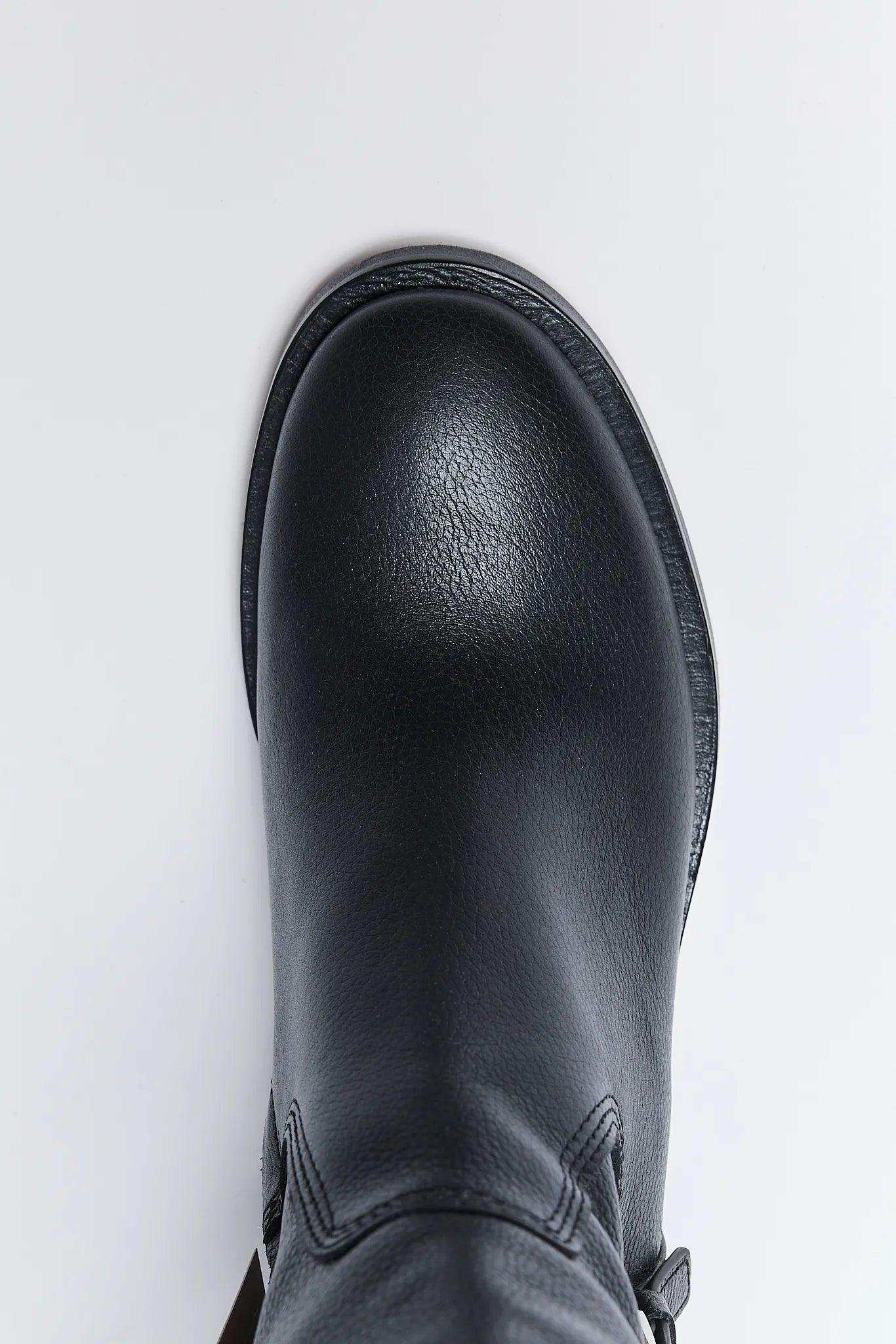 Black leather Kilian Boots on a white background