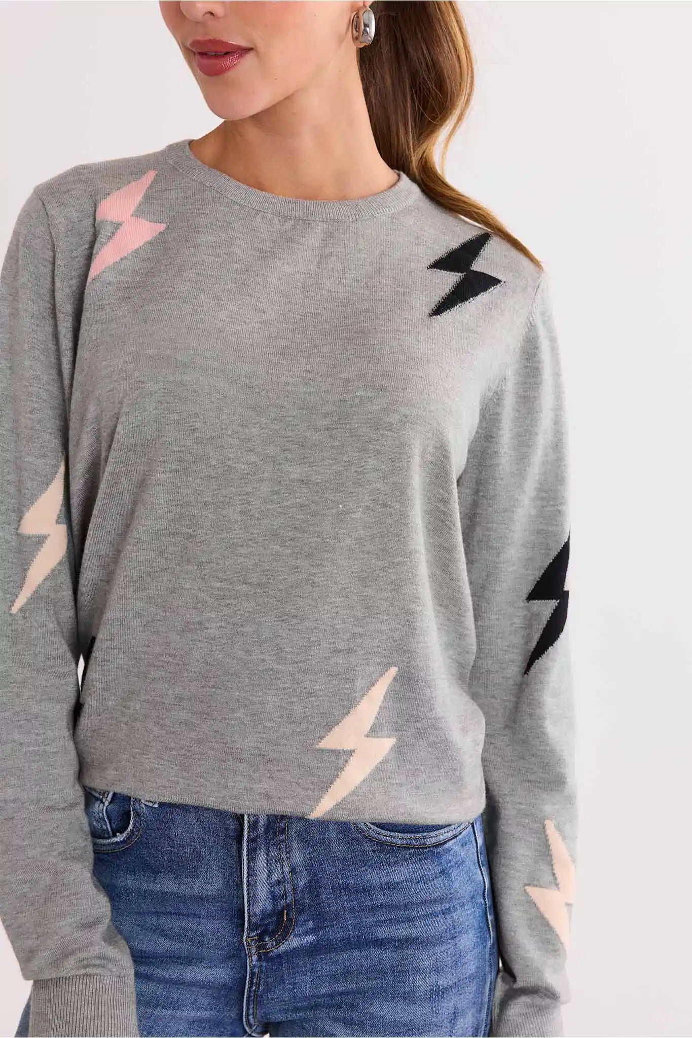 Close up of Lightning Bolt Gray Knit Sweater on women on white background