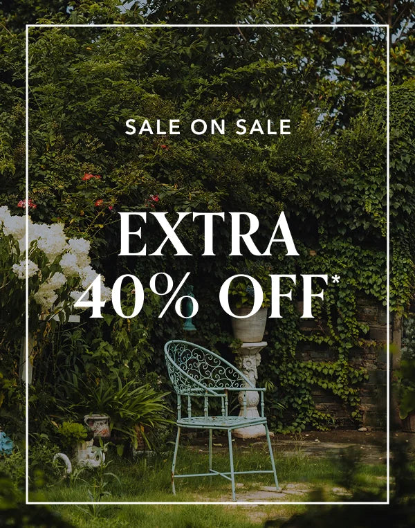 Garden scene with a bench and decorative elements, featuring a sale promotion text overlay.