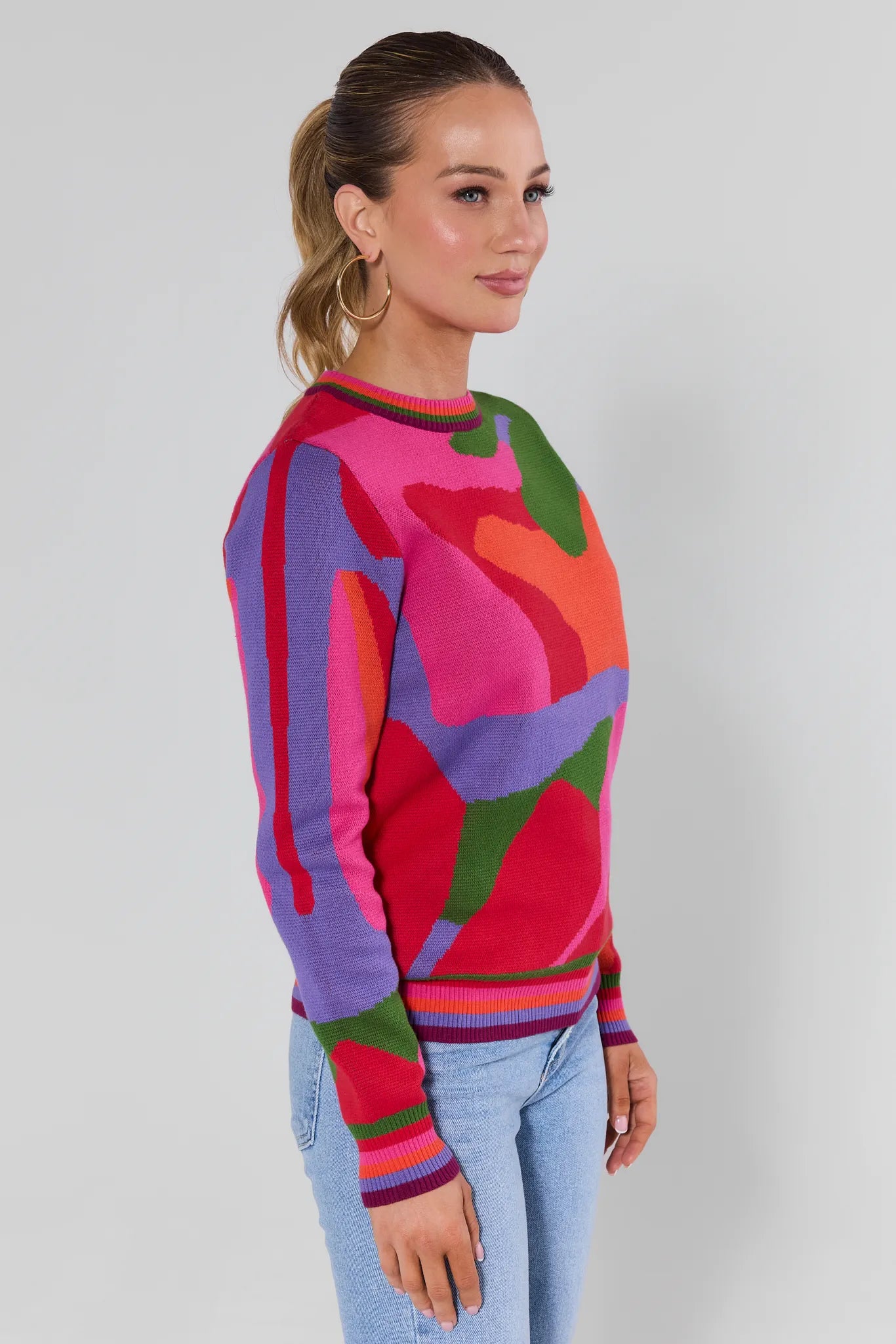 Woman wearing a Marcia Multicolor Knit Sweater against a plain background