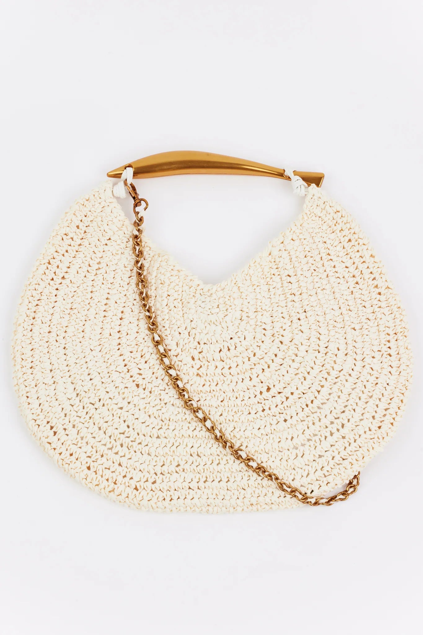 Brielle Bag- Ivory: Cream crochet shoulder bag with gold-tone top handle and chain strap. Features slouch style, spacious interior, and removable crossbody chain.