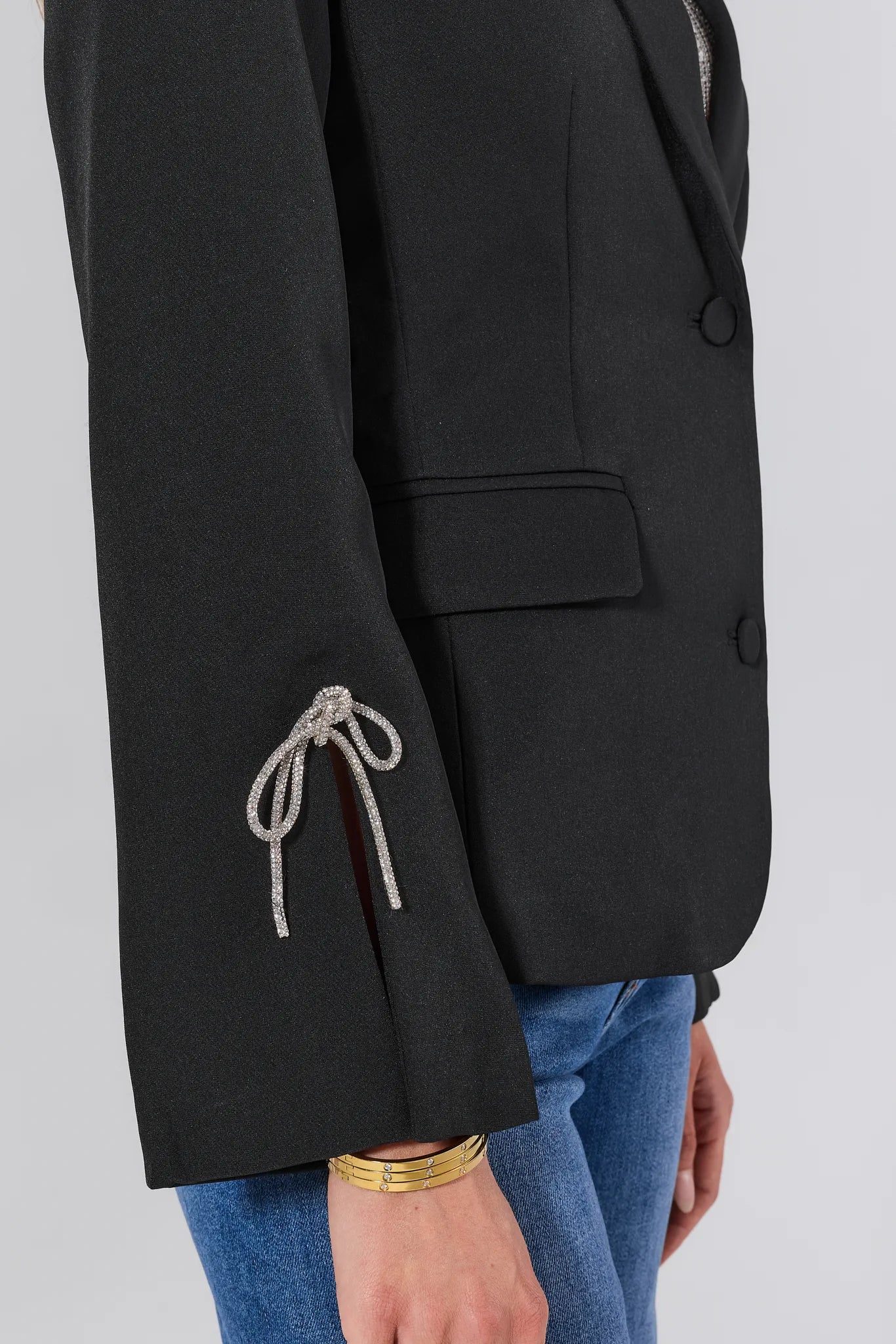 Drew Black Bow Blazer with decorative bow detail on a plain background