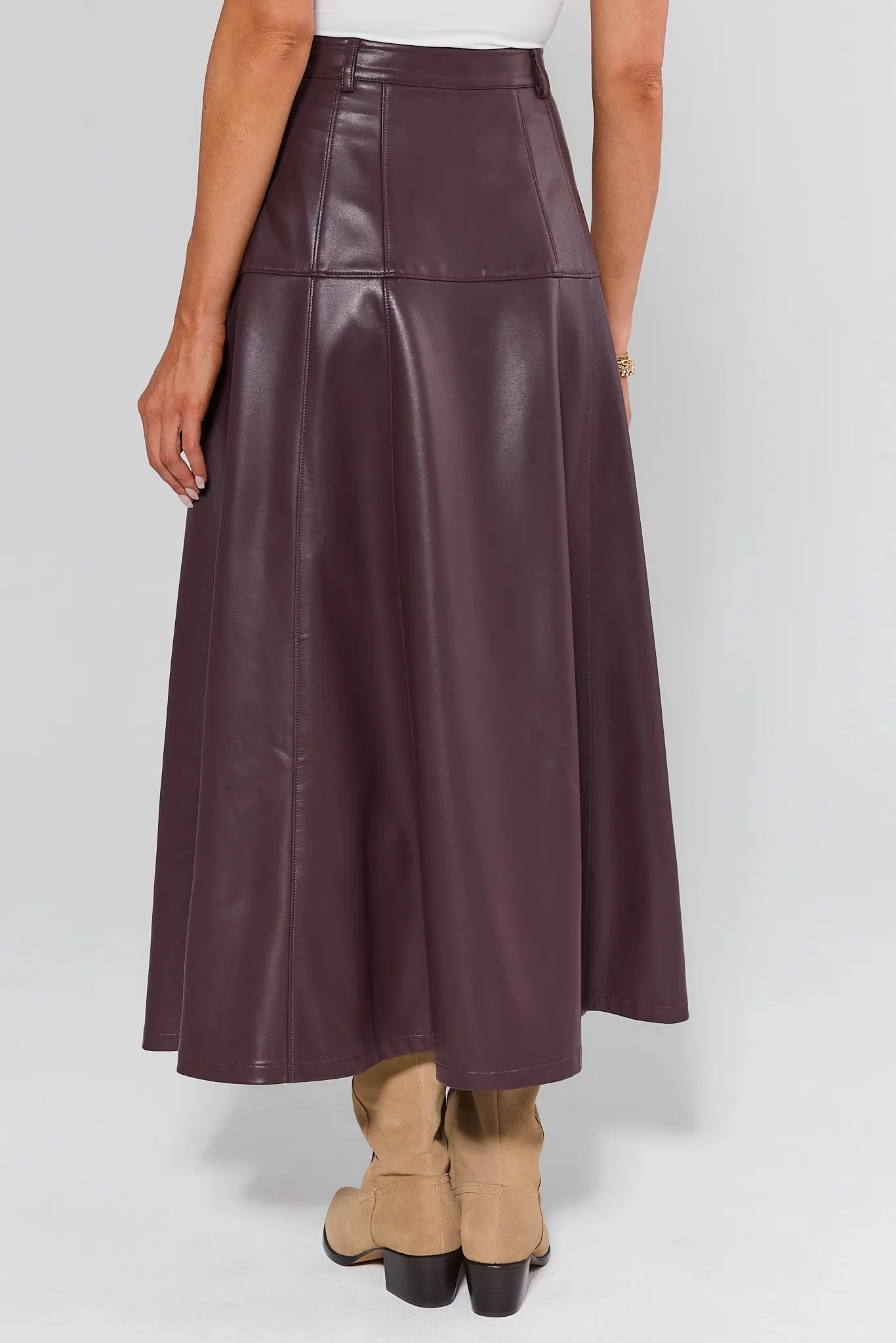 Brown leather Preston Skirt worn by a person on a white background