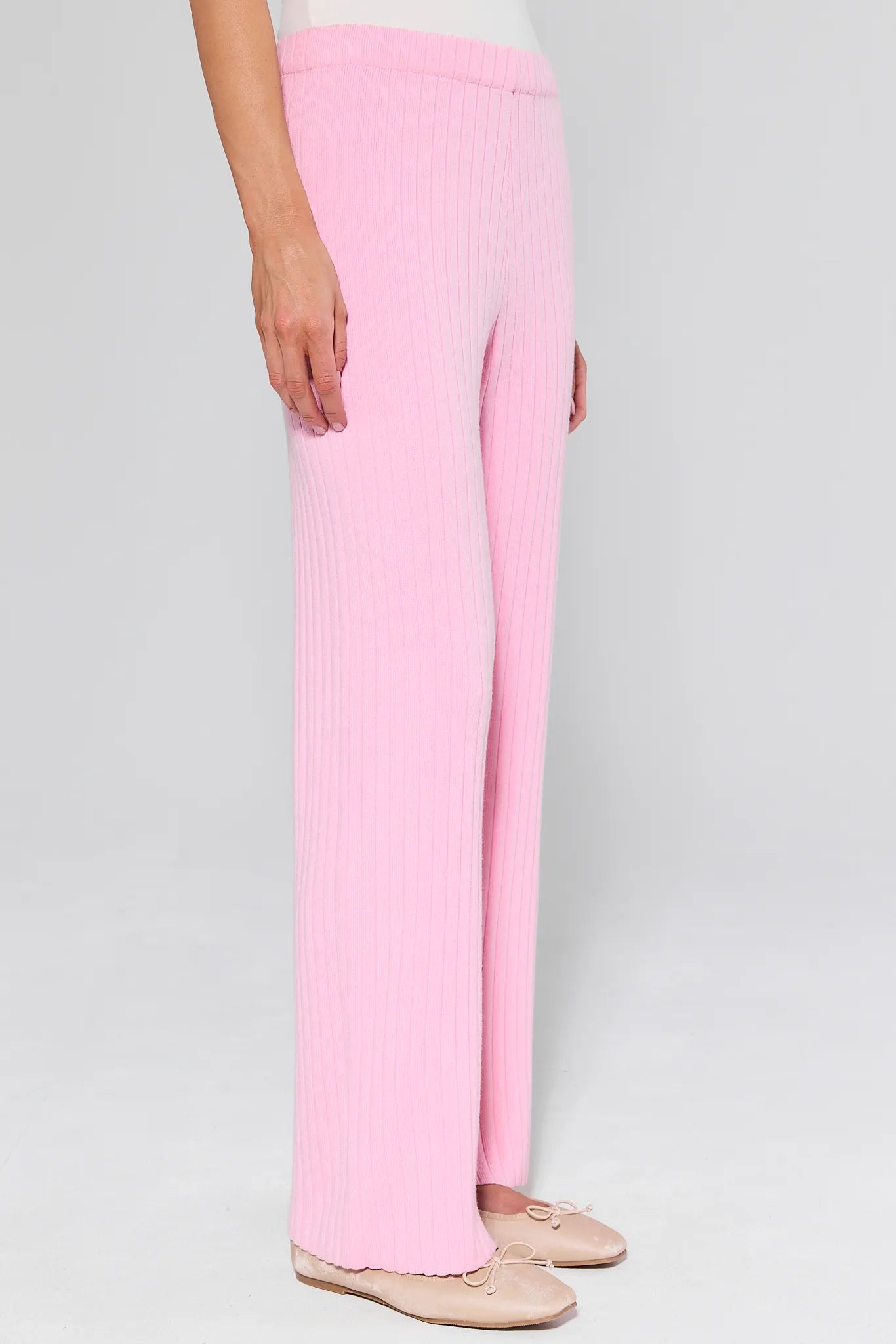 Brianna Pink Ribbed Pants on a gray background
