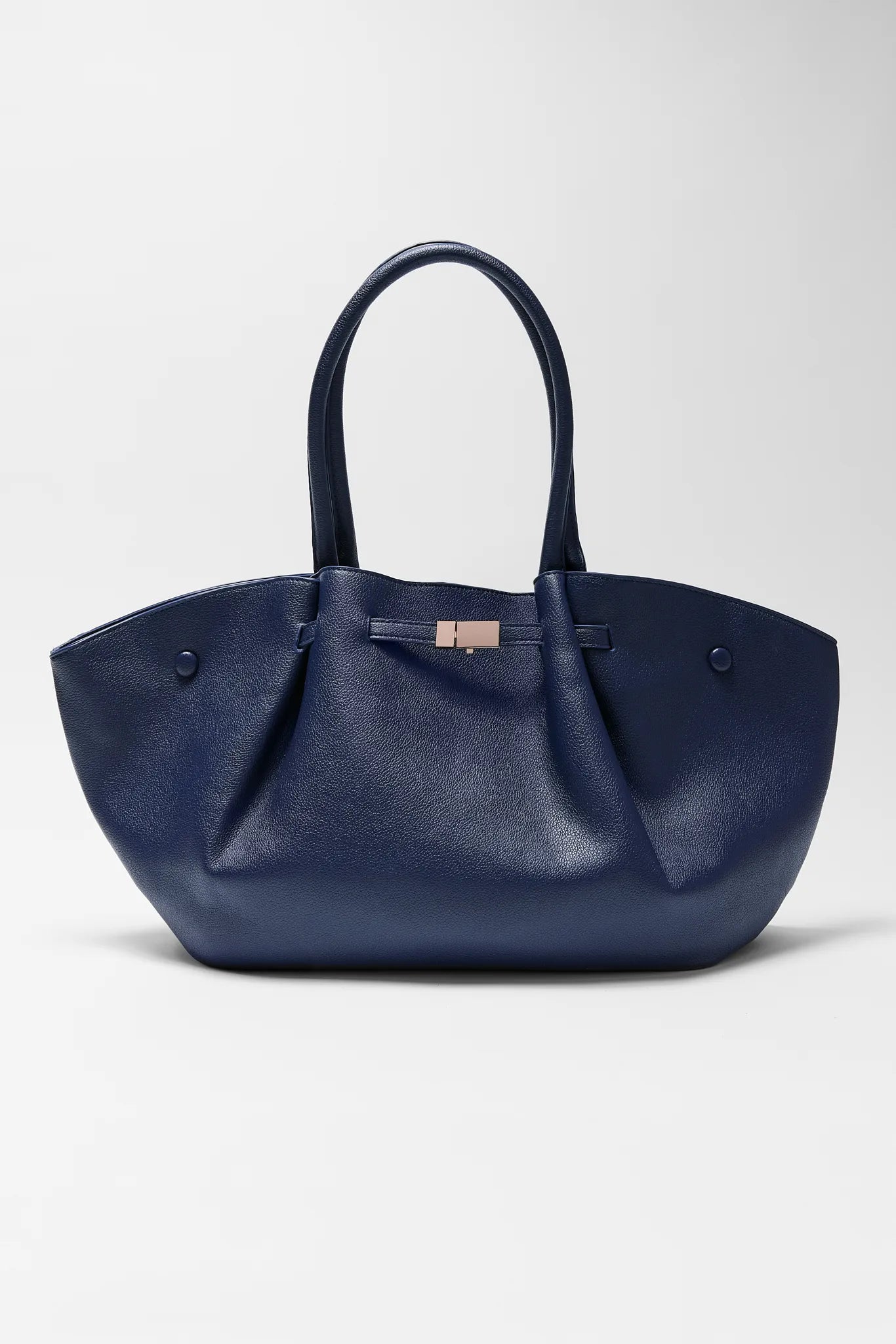 Navy blue handbag on a light gray background Kyra Navy Faux Leather Bag