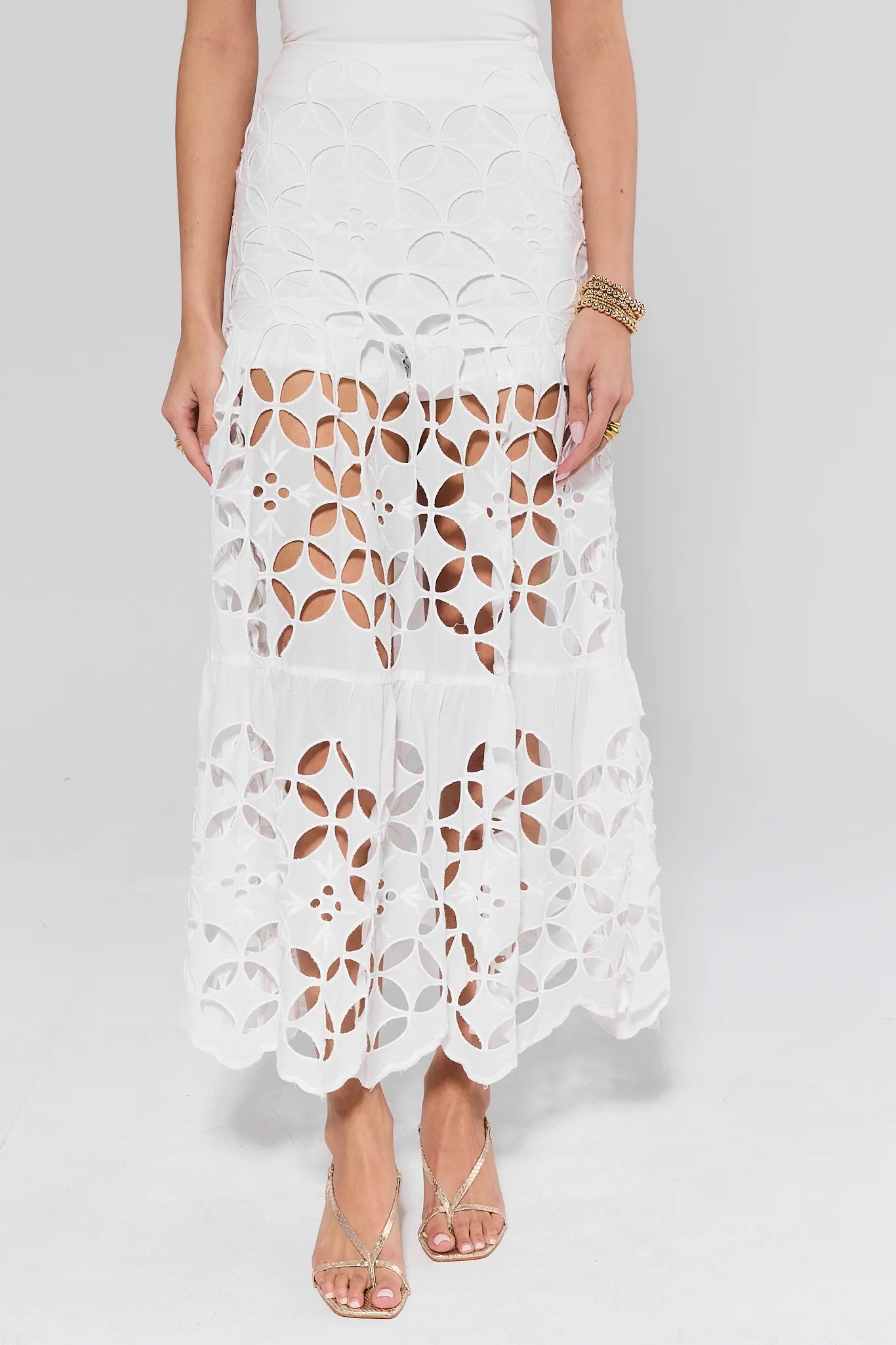 Cynthia White Cutout Maxi Skirt worn by a person on a white background