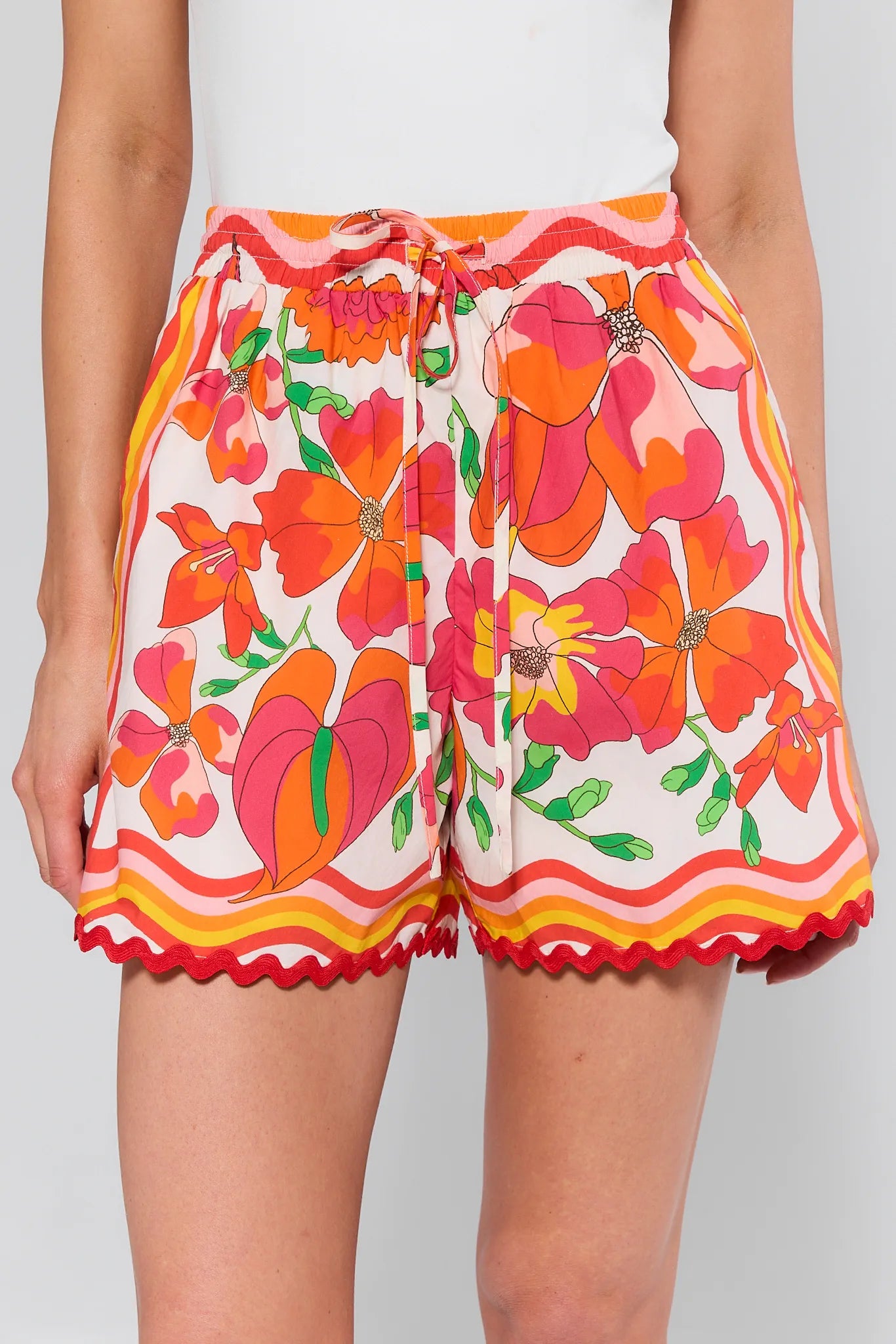 Melissa Orange Printed Drawstring Shorts with a white background