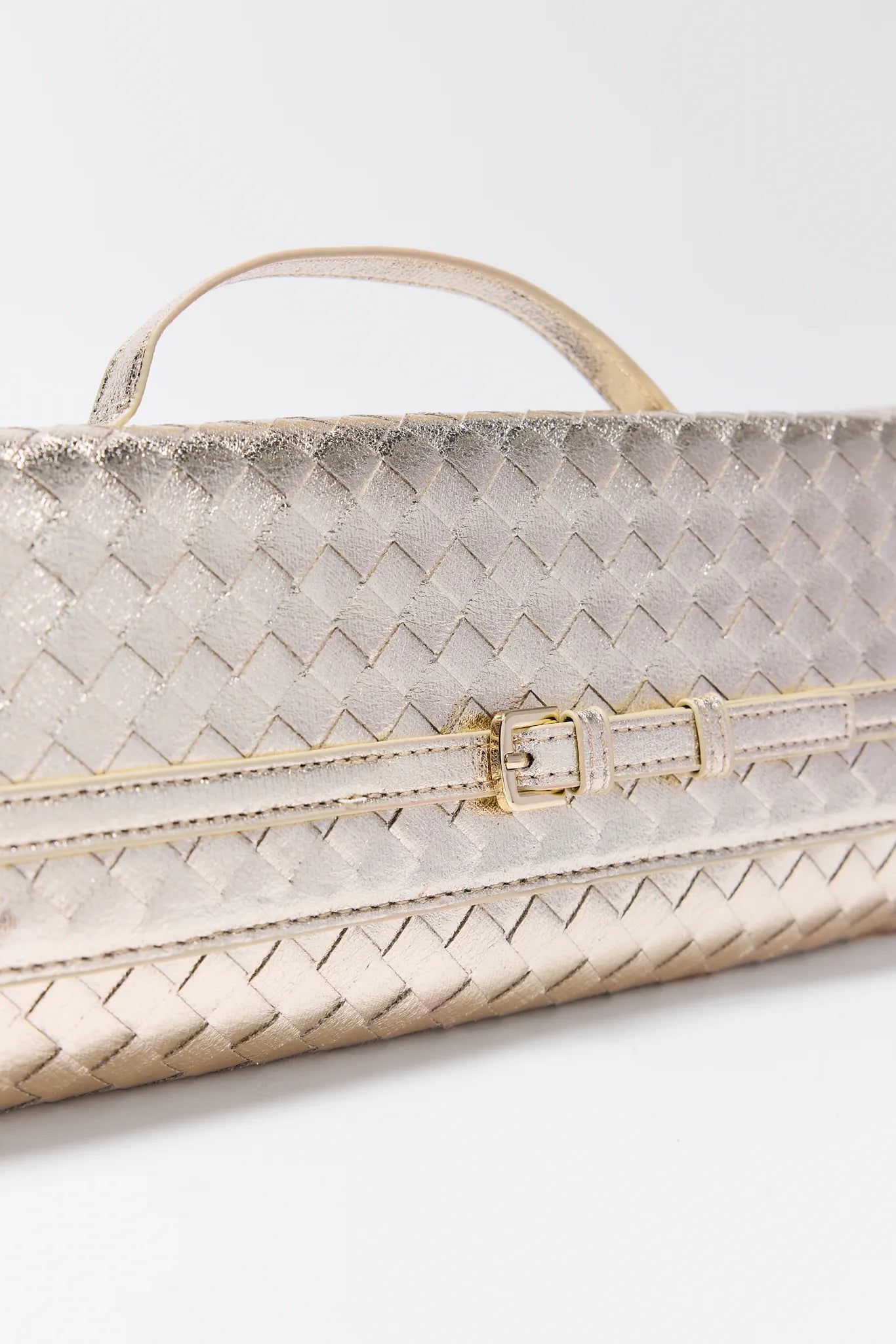 Emerson Gold Faux Leather Bag with gold accents on a light gray background