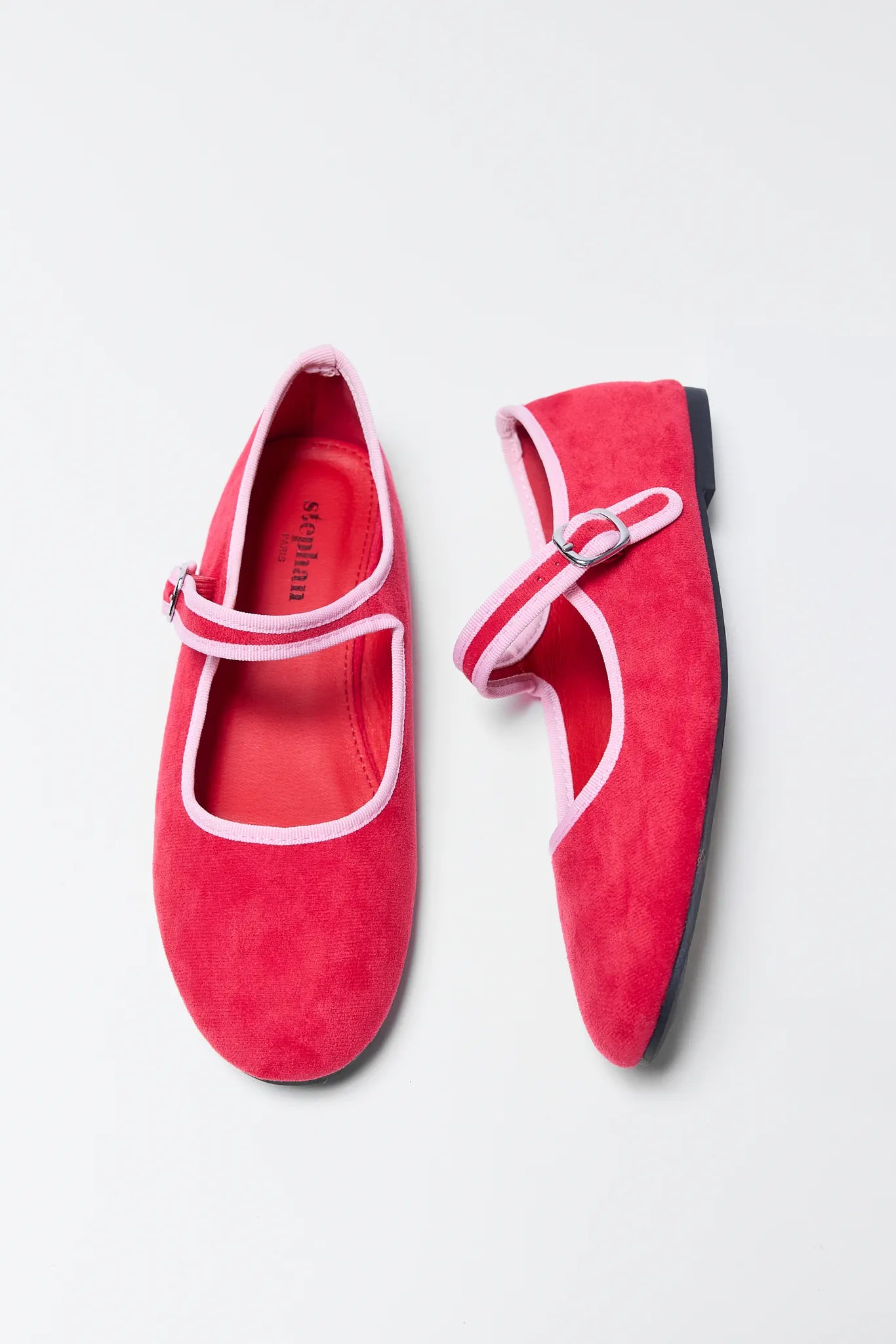 Ellie Red Velvet Flats with pink straps on a light gray background