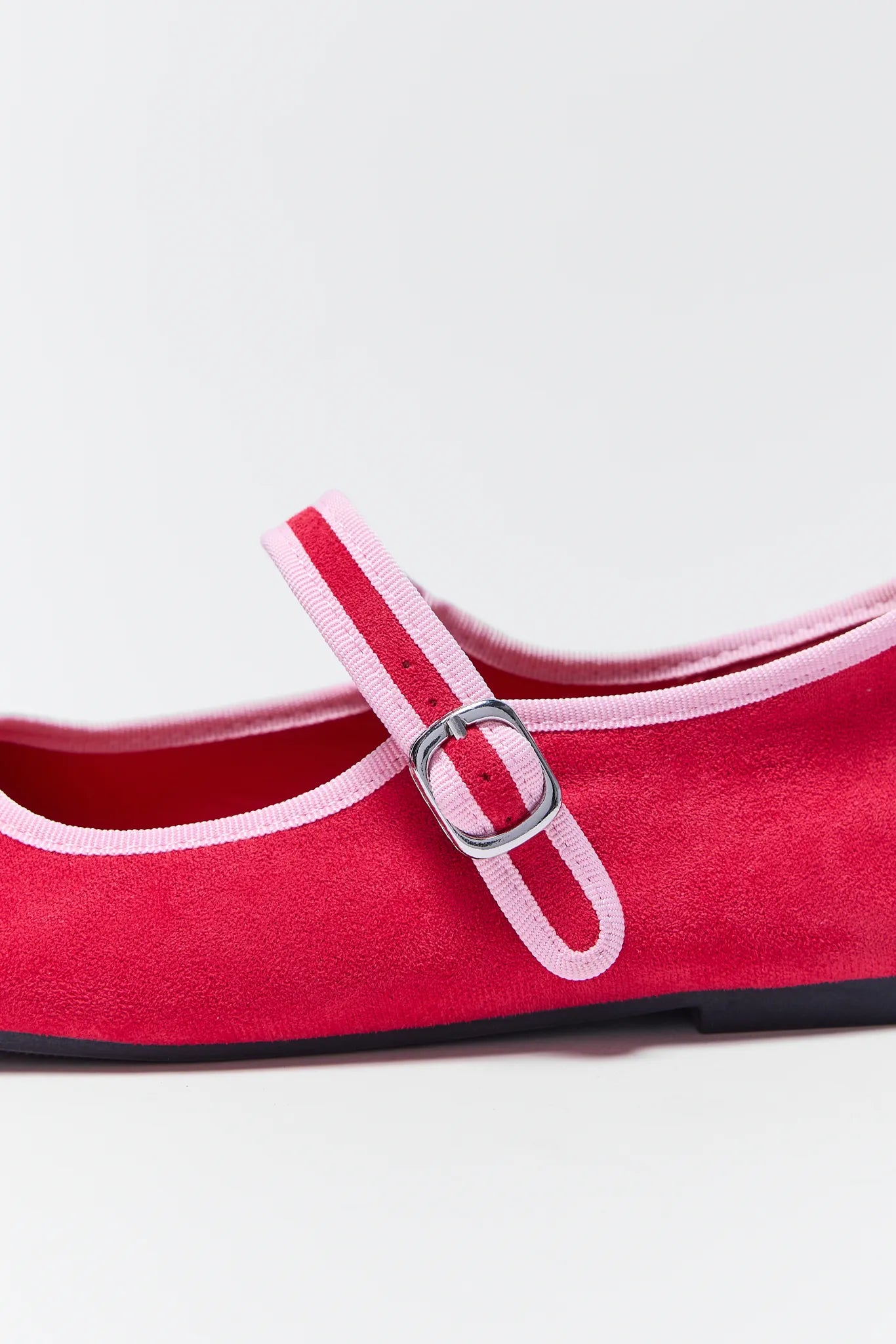 Ellie Red Velvet Flats with pink straps on a light gray background