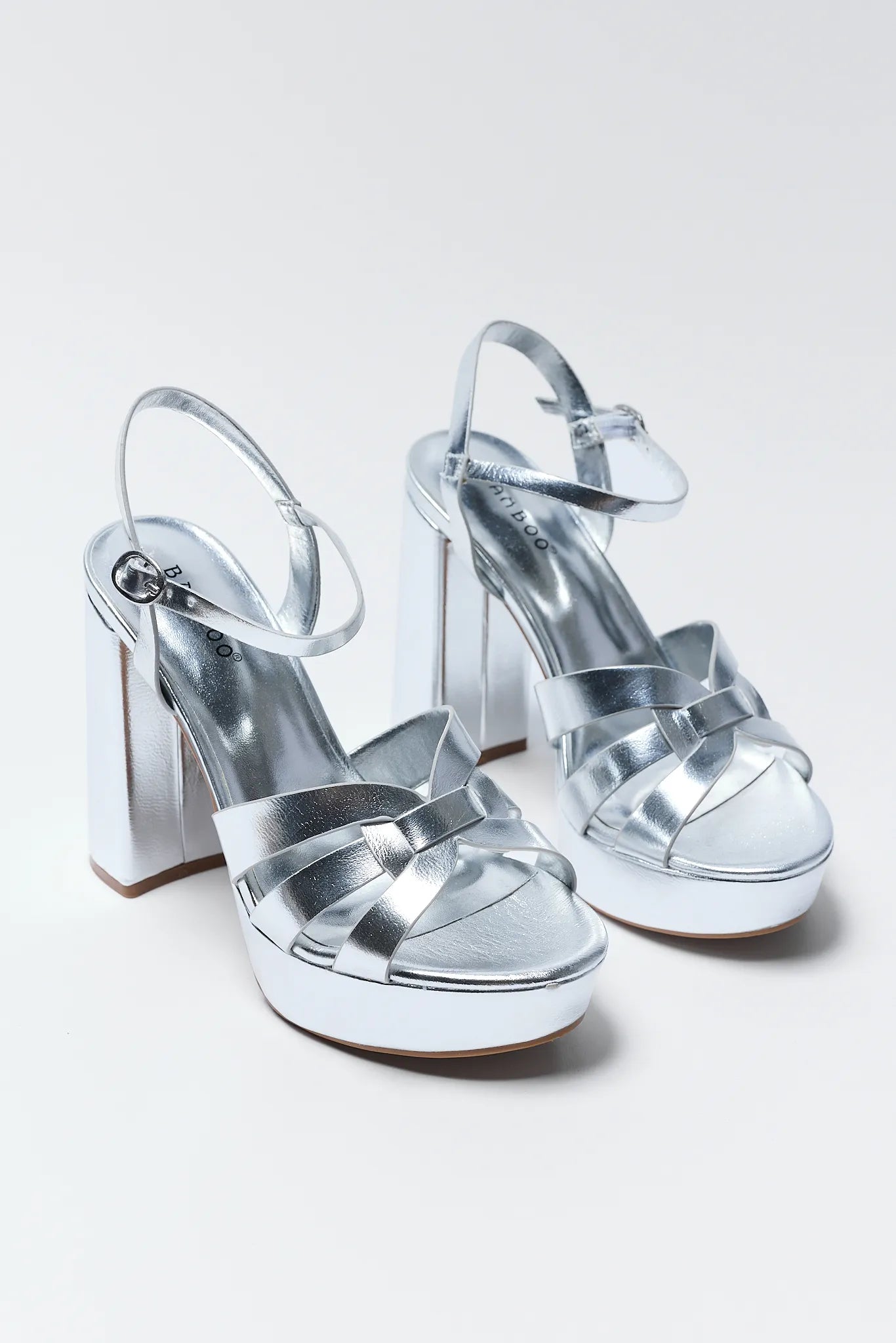 Rachel Silver Platform Heels on a white background