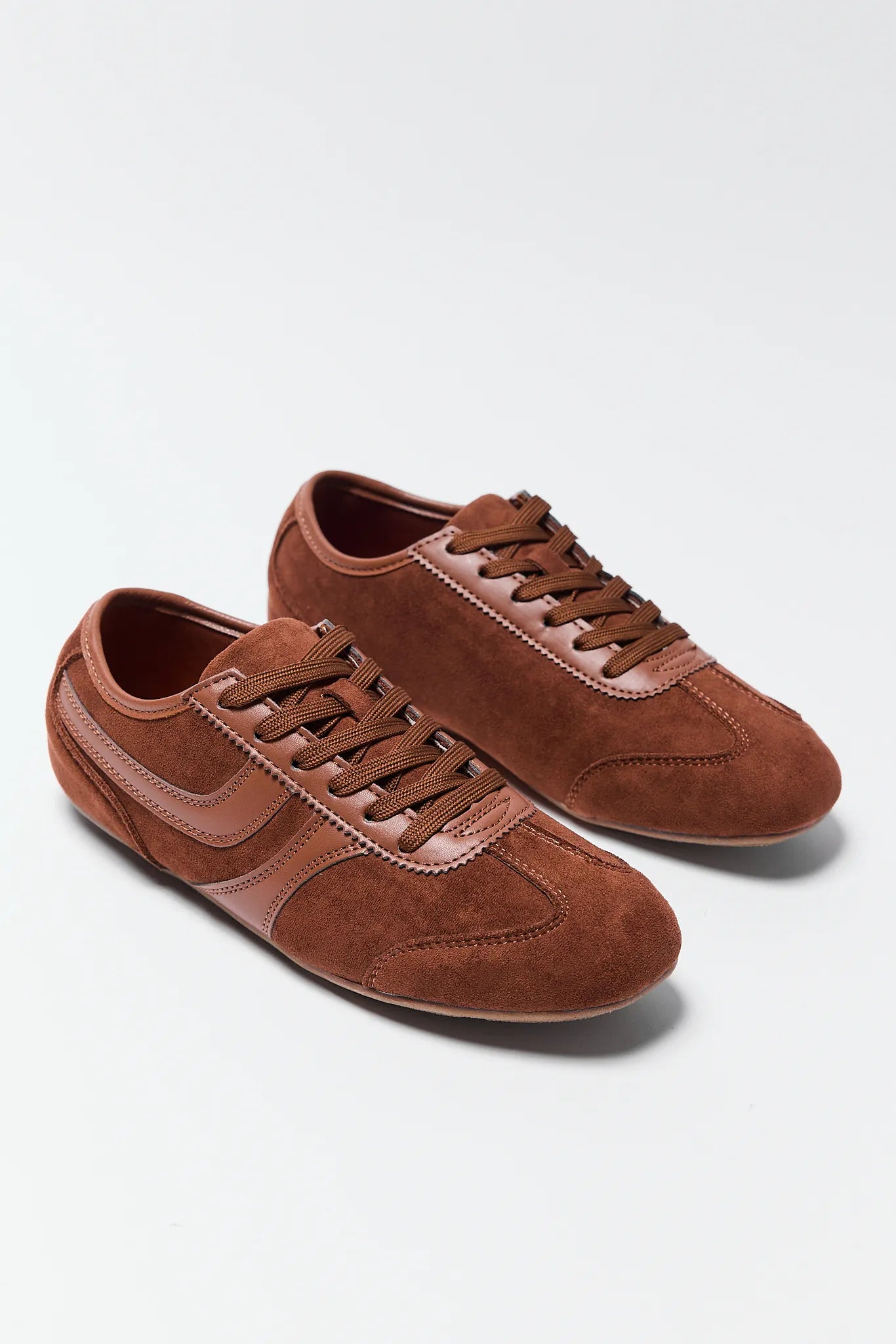 Molly Brown Faux Suede Sneakers on white background