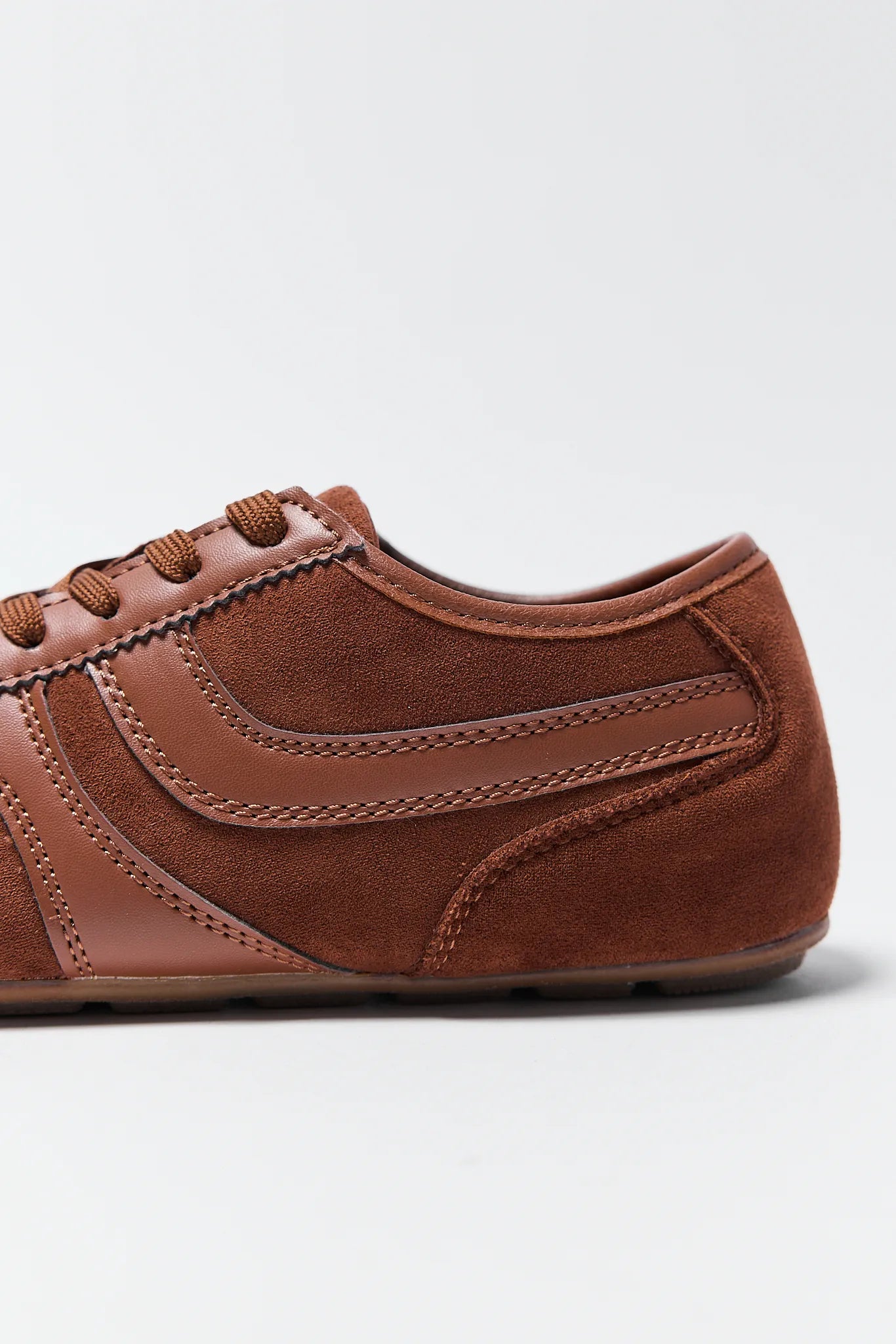 Molly Brown Faux Suede Sneakers on white background