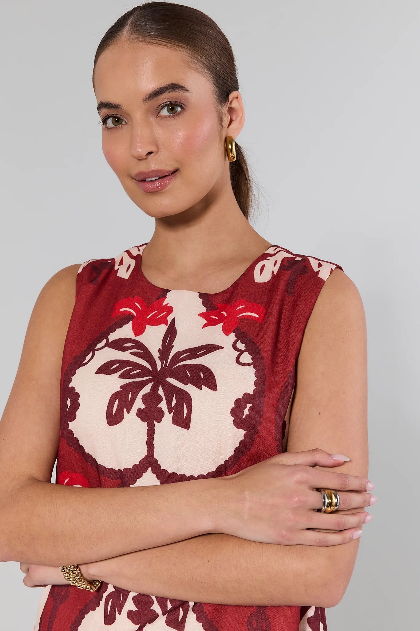 Woman wearing a Celine Maroon Printed Tank Top against a plain background