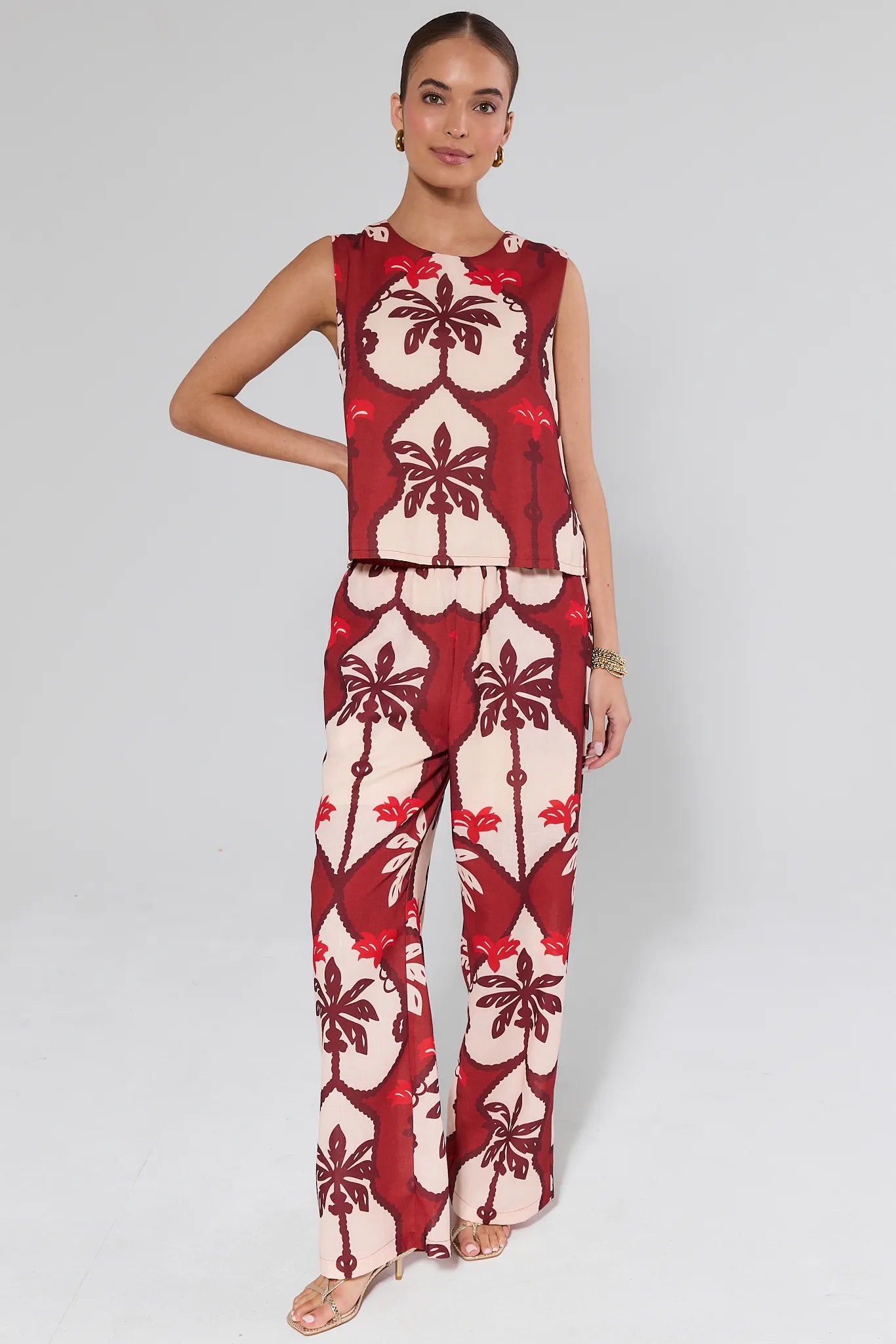 Woman wearing a Celine Maroon Printed Tank Top against a plain background