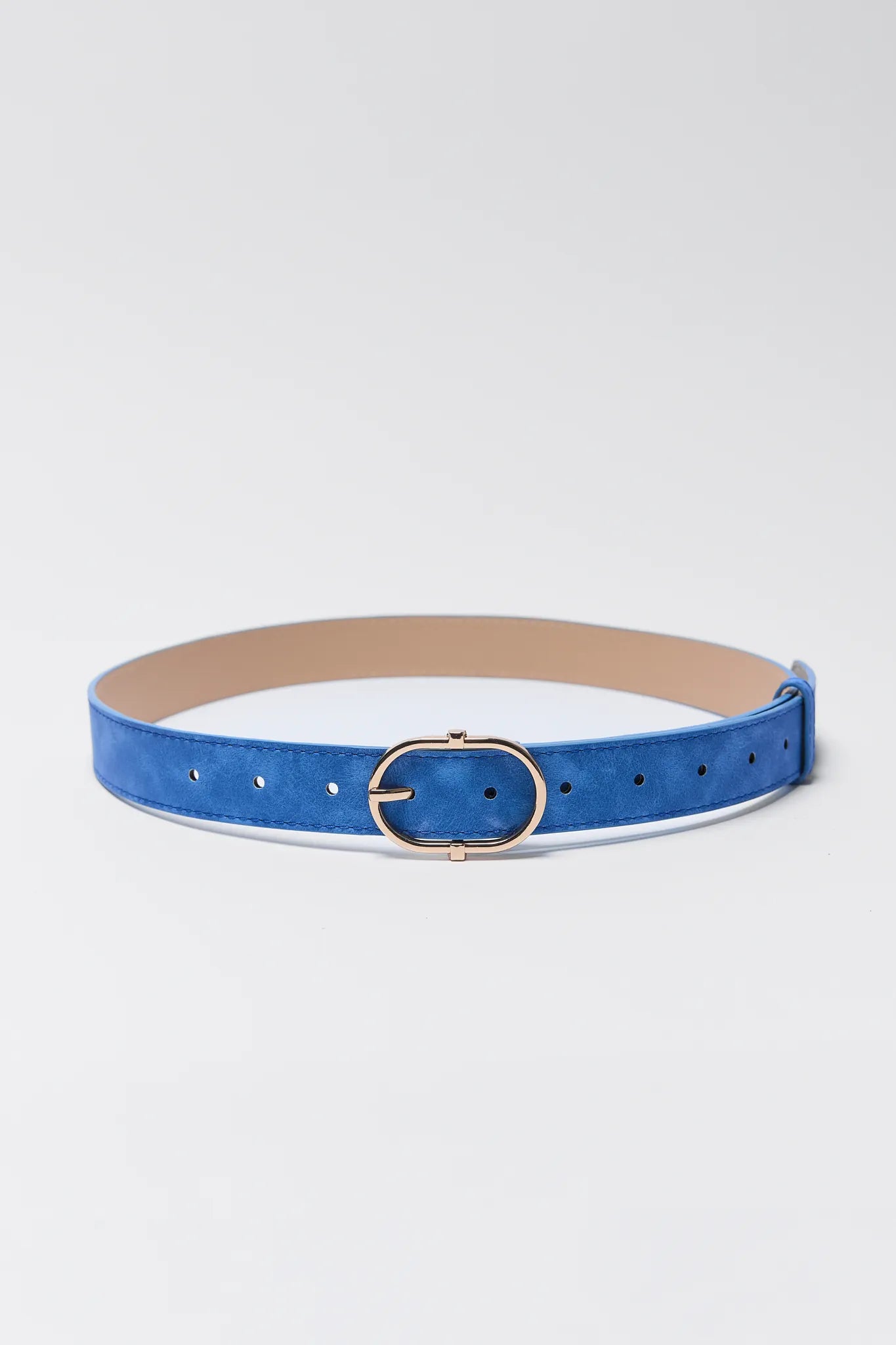 Blue belt with a gold buckle on a white background Trisha Blue Faux Suede Belt