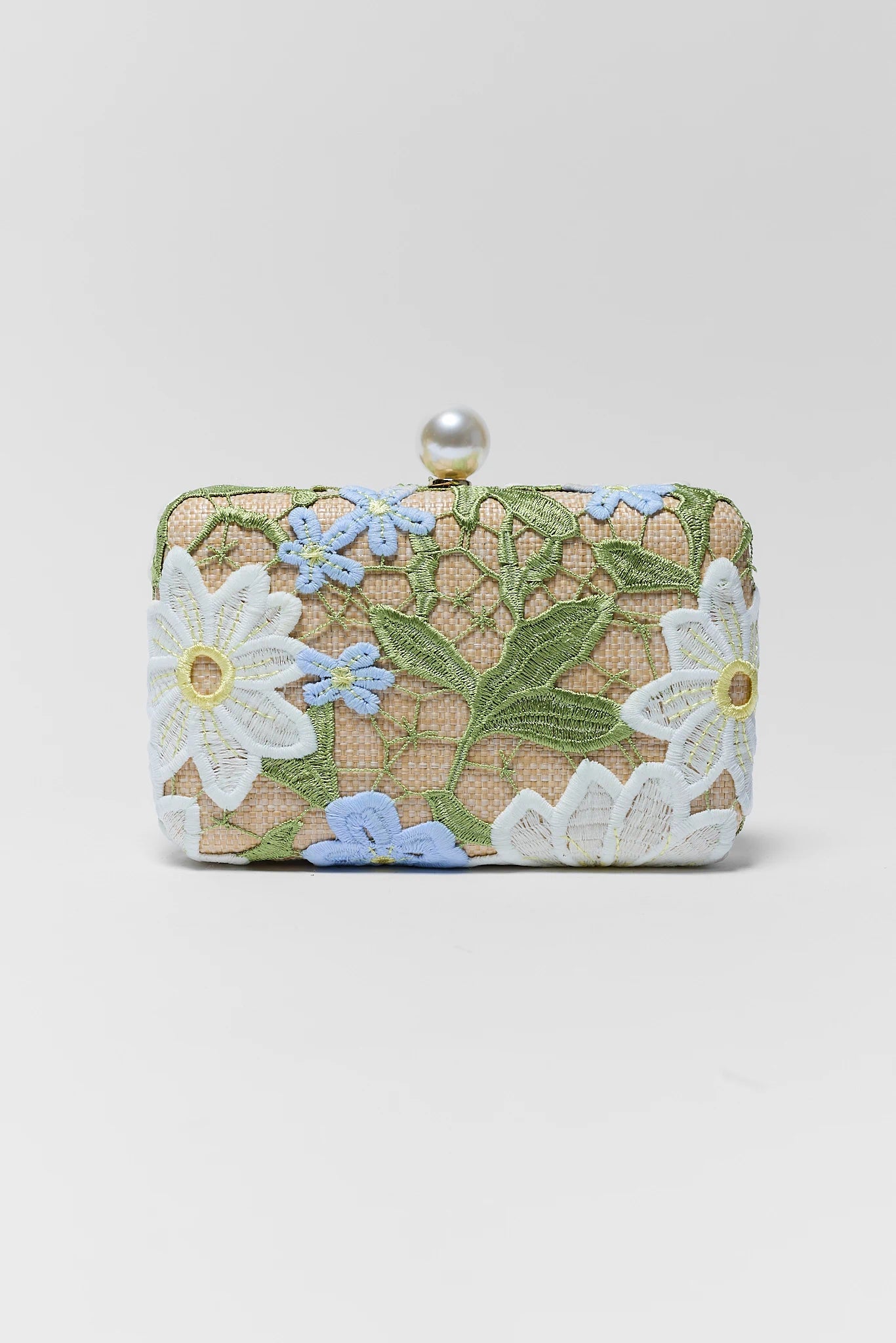 Floral embroidered clutch bag on a white background