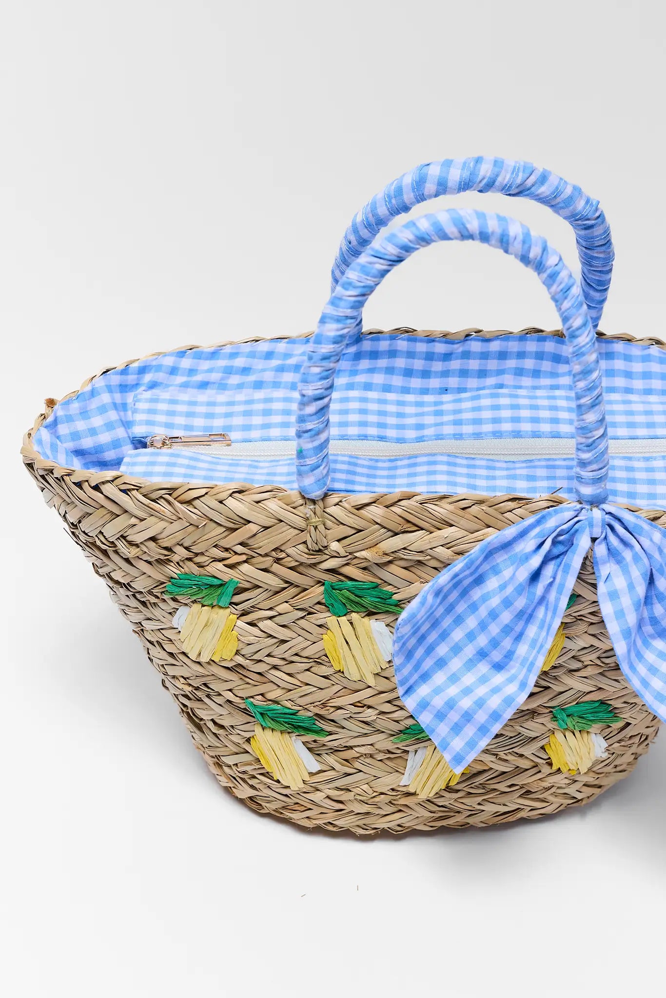 close up of Gentry Woven Raffia Lemon Bag