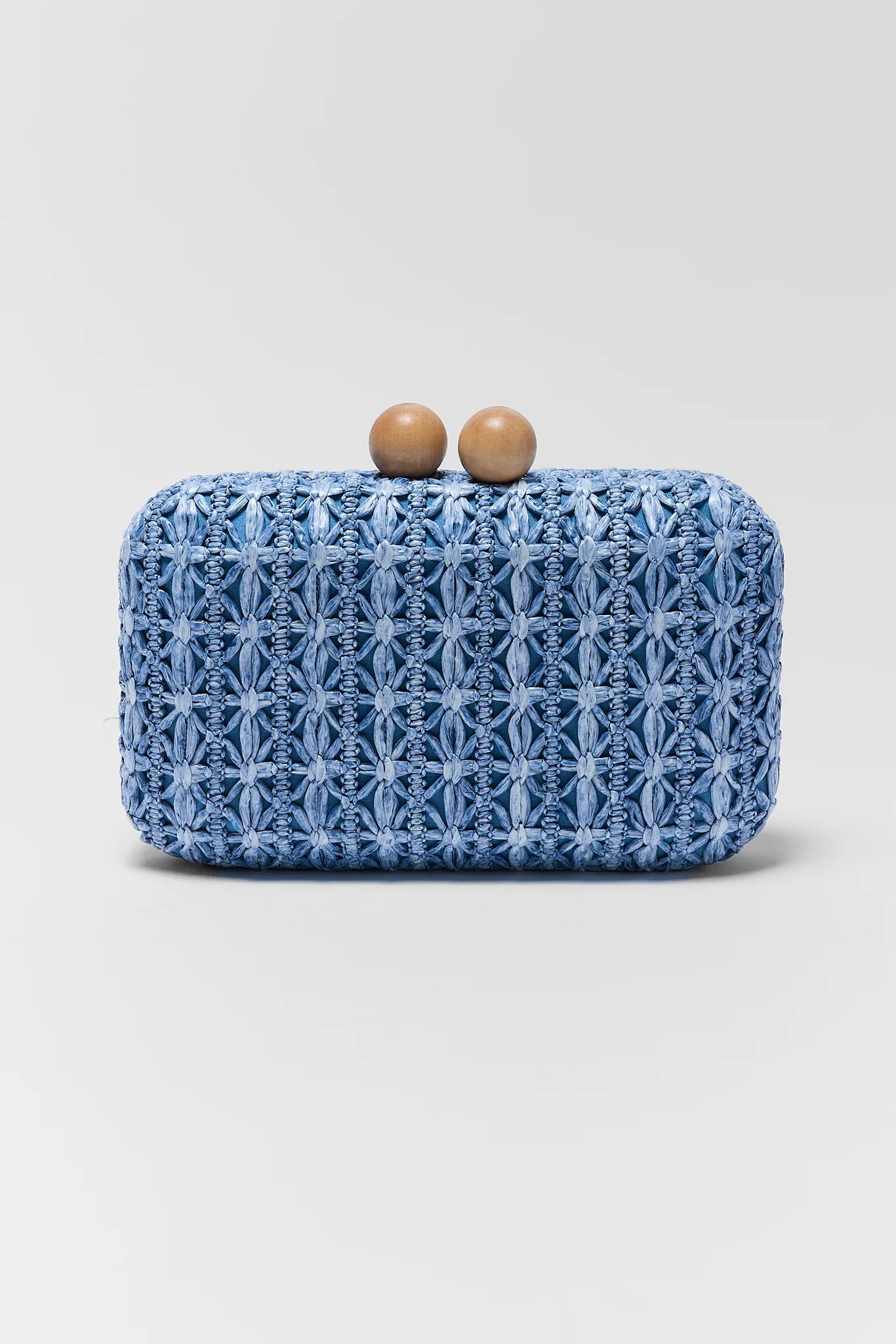close up of Martha Blue Woven Clutch on white background