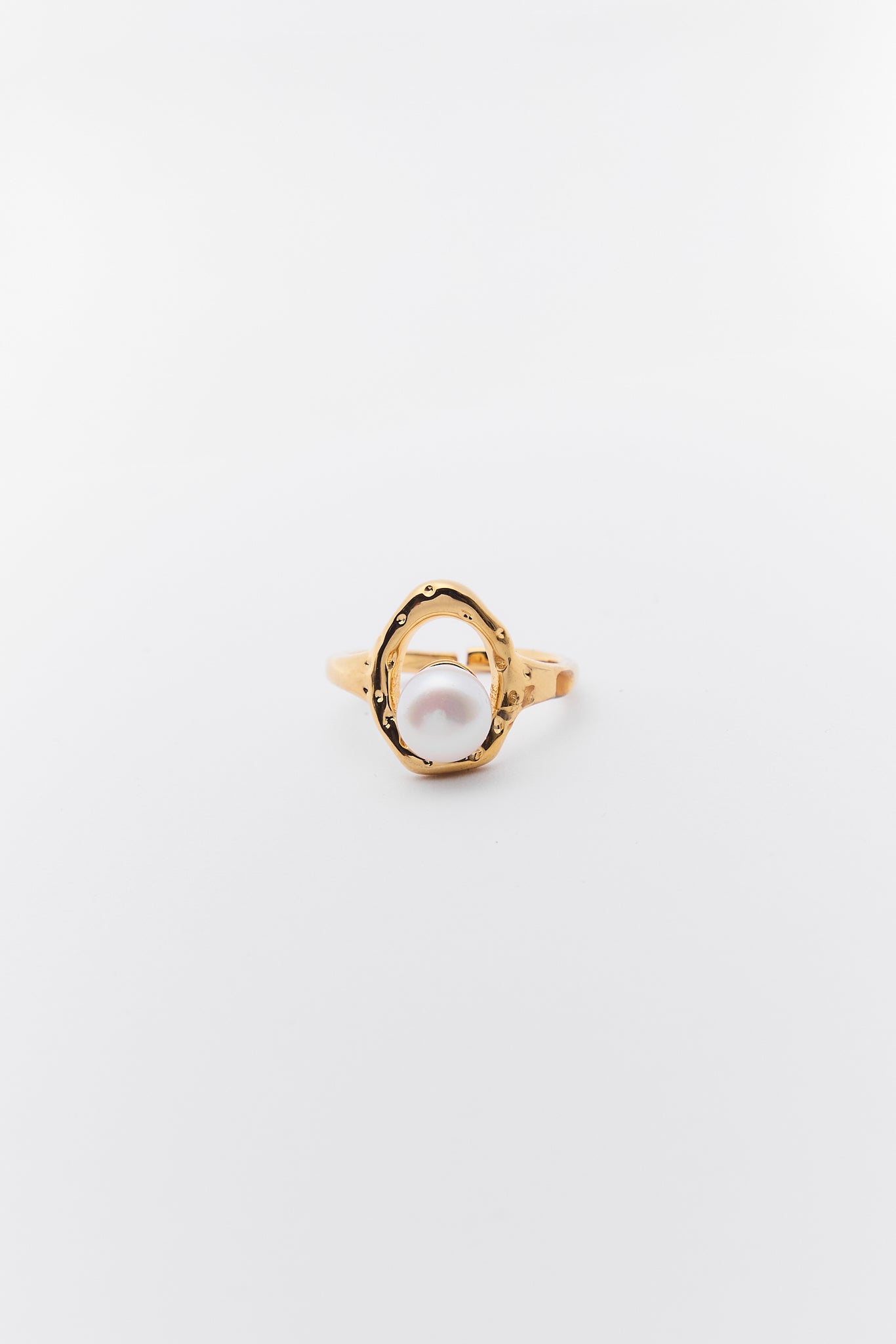 Margot Gold Pearl Ring on a light gray background