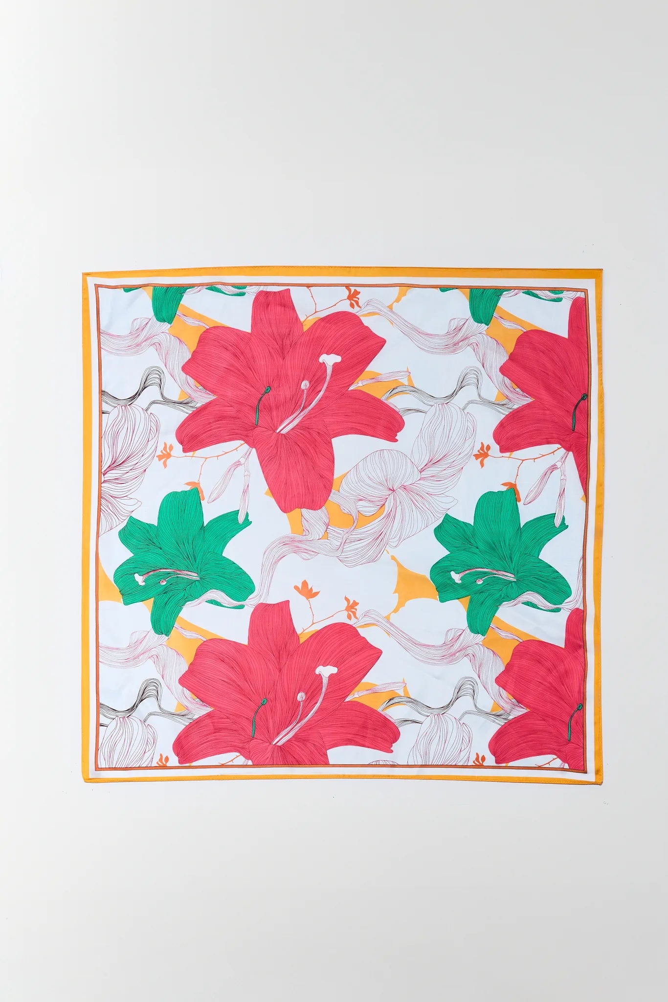 Floral patterned fabric with red, green, and white flowers on a white background