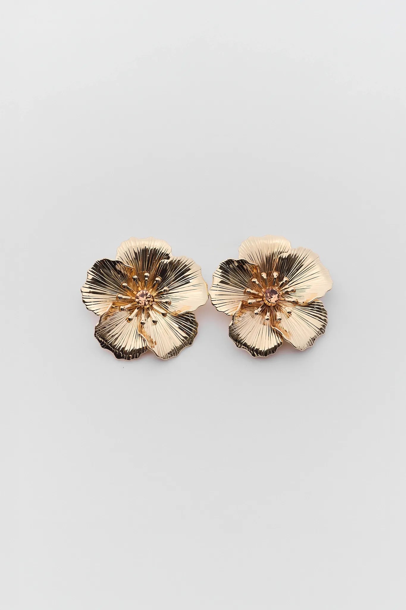 Andrea Gold Flower Stud Earrings on a white background