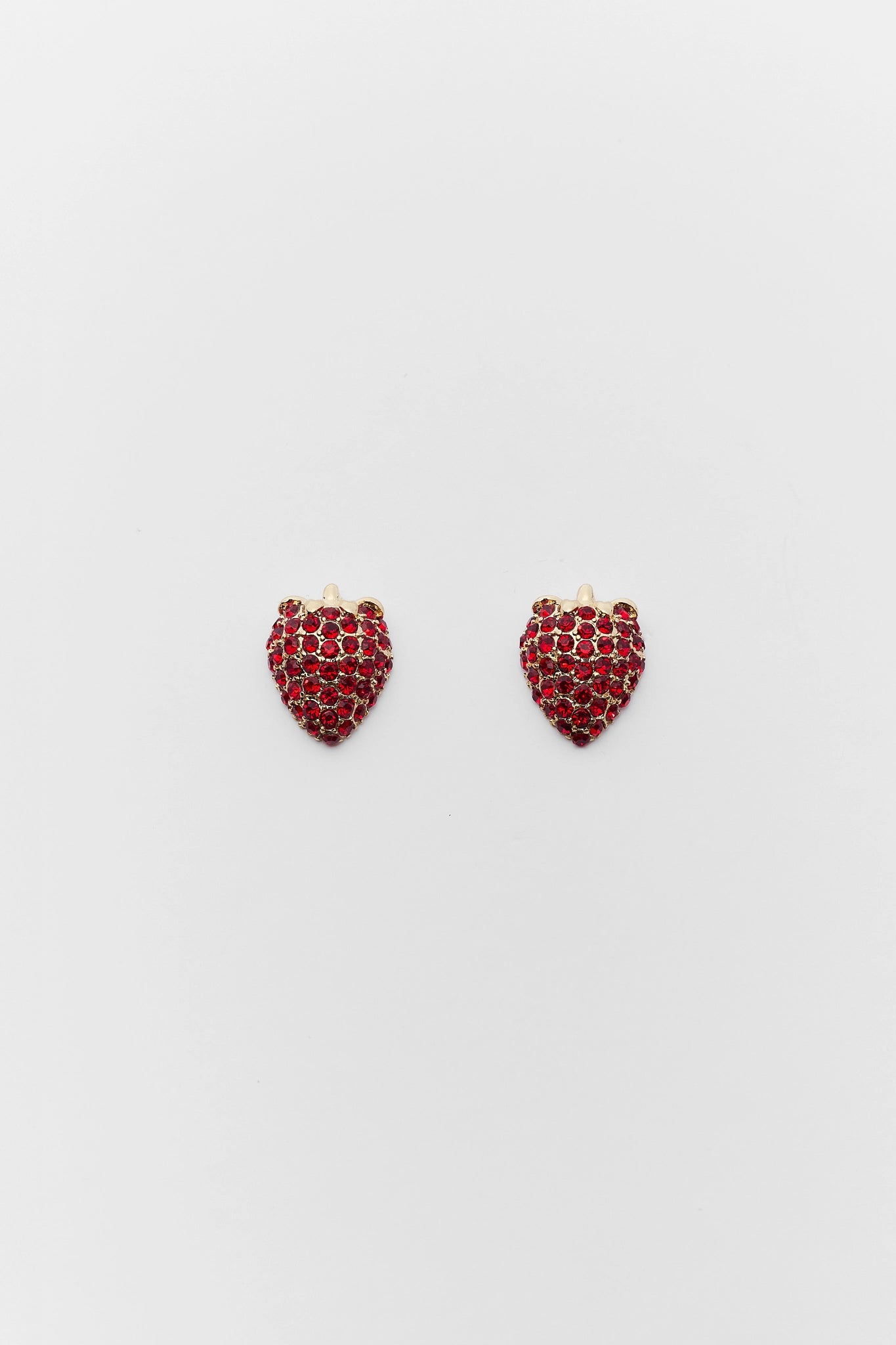 strawberry earrings on white background