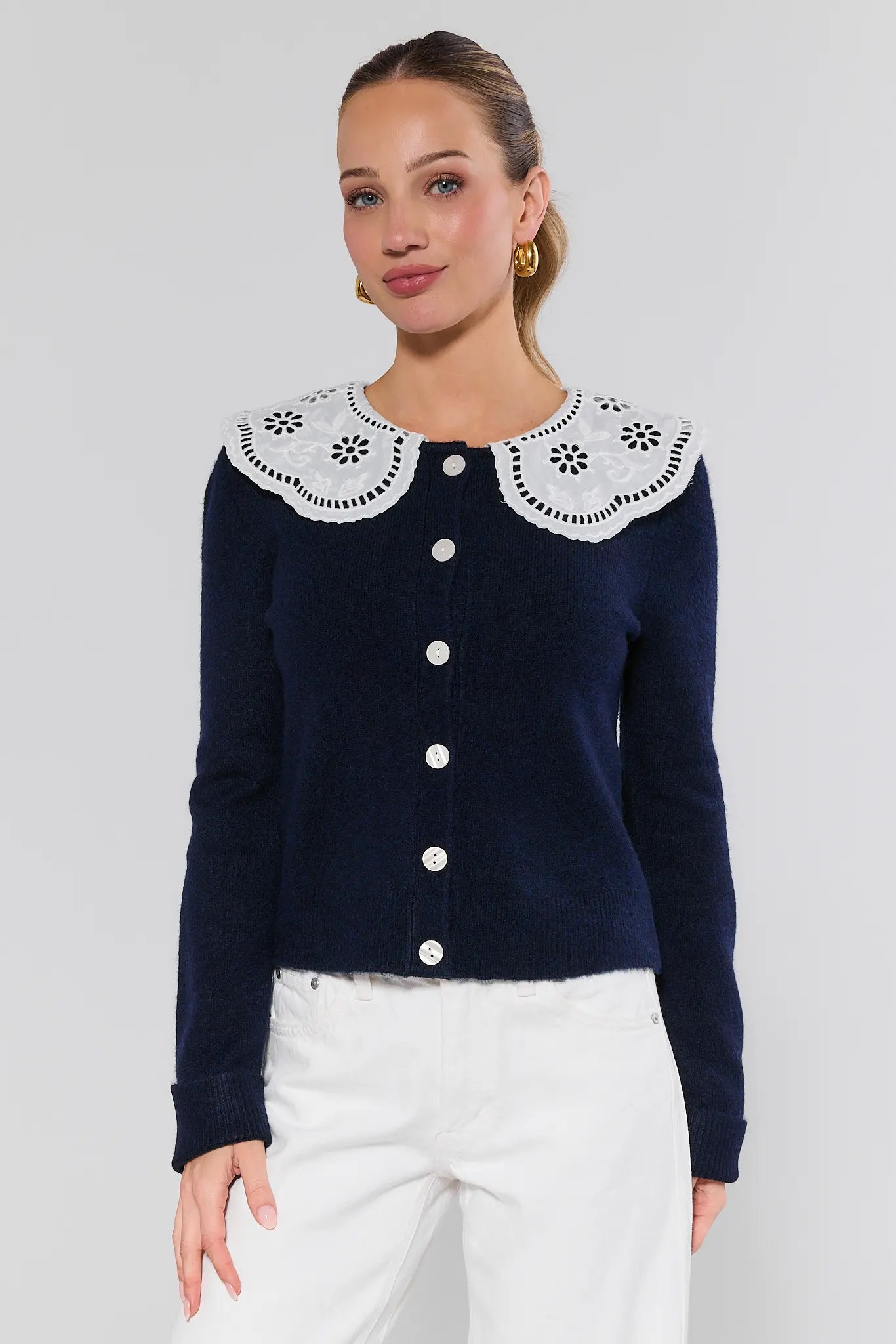 woman wearing navy sweater