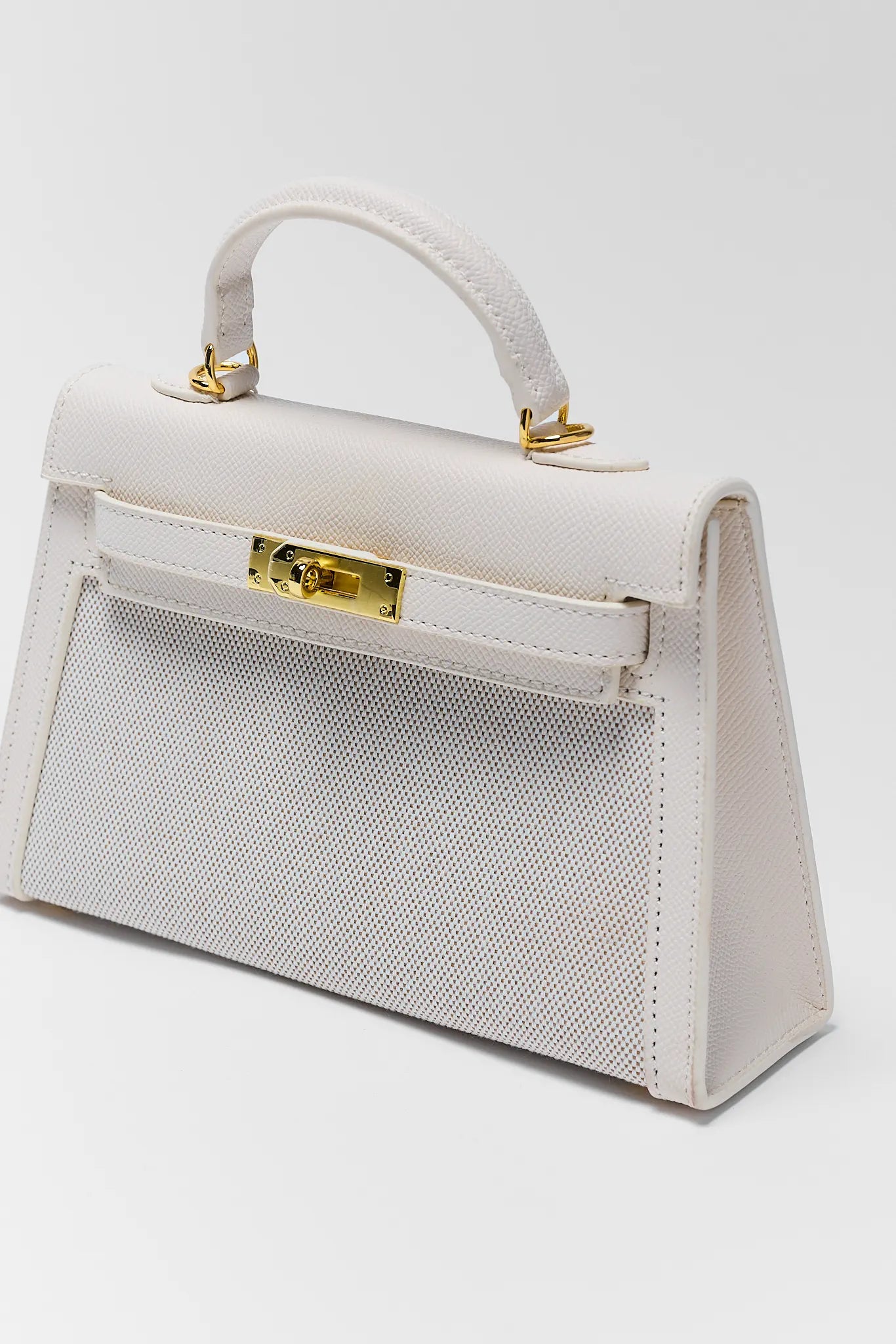 close up of Helen Cream Faux Leather Bag on white background