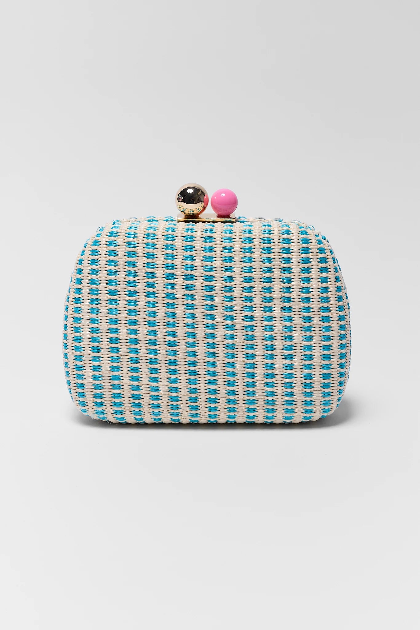 Blue and white patterned clutch bag with decorative elements on a light gray background