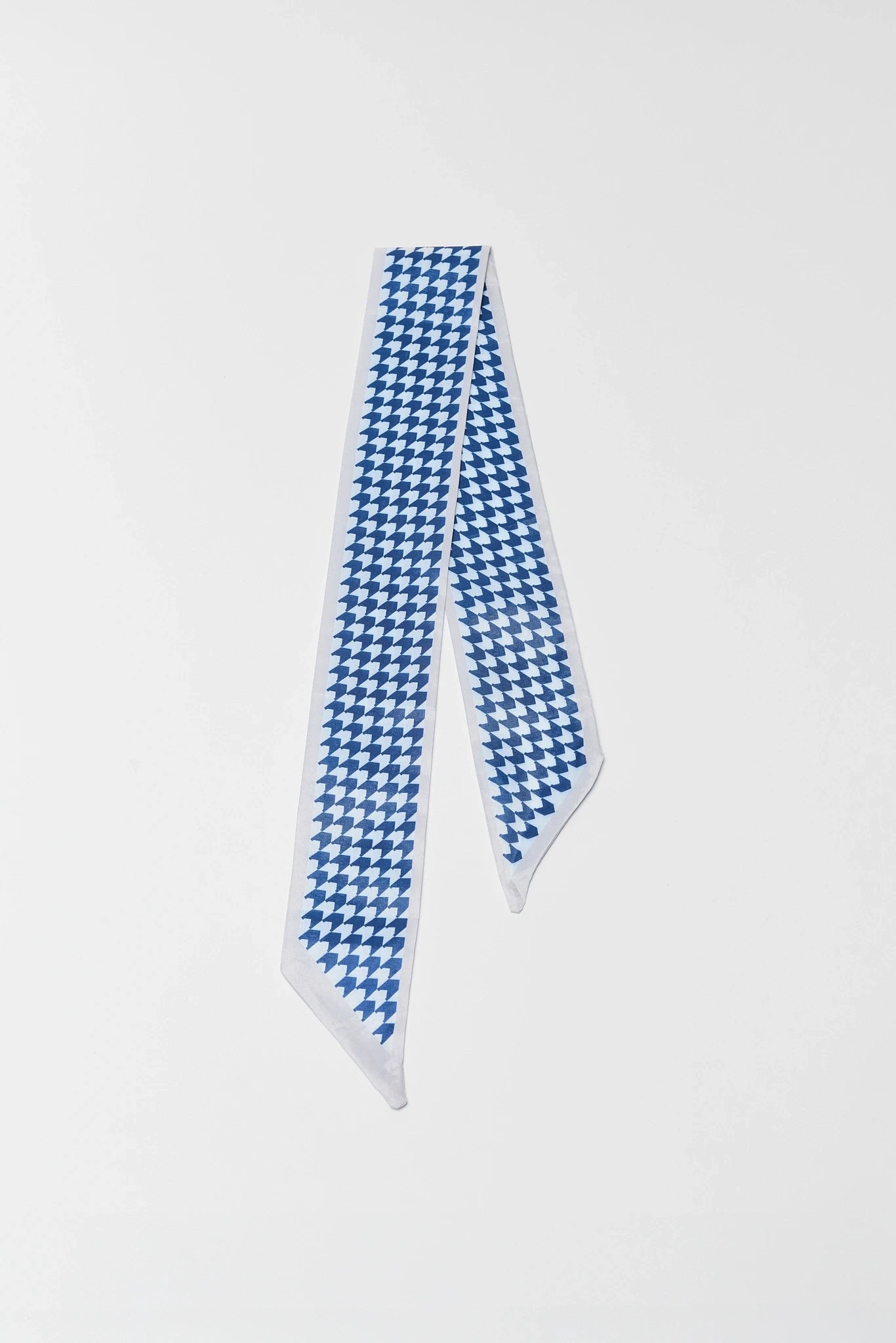 Blue and white checkered scarf on a light gray background