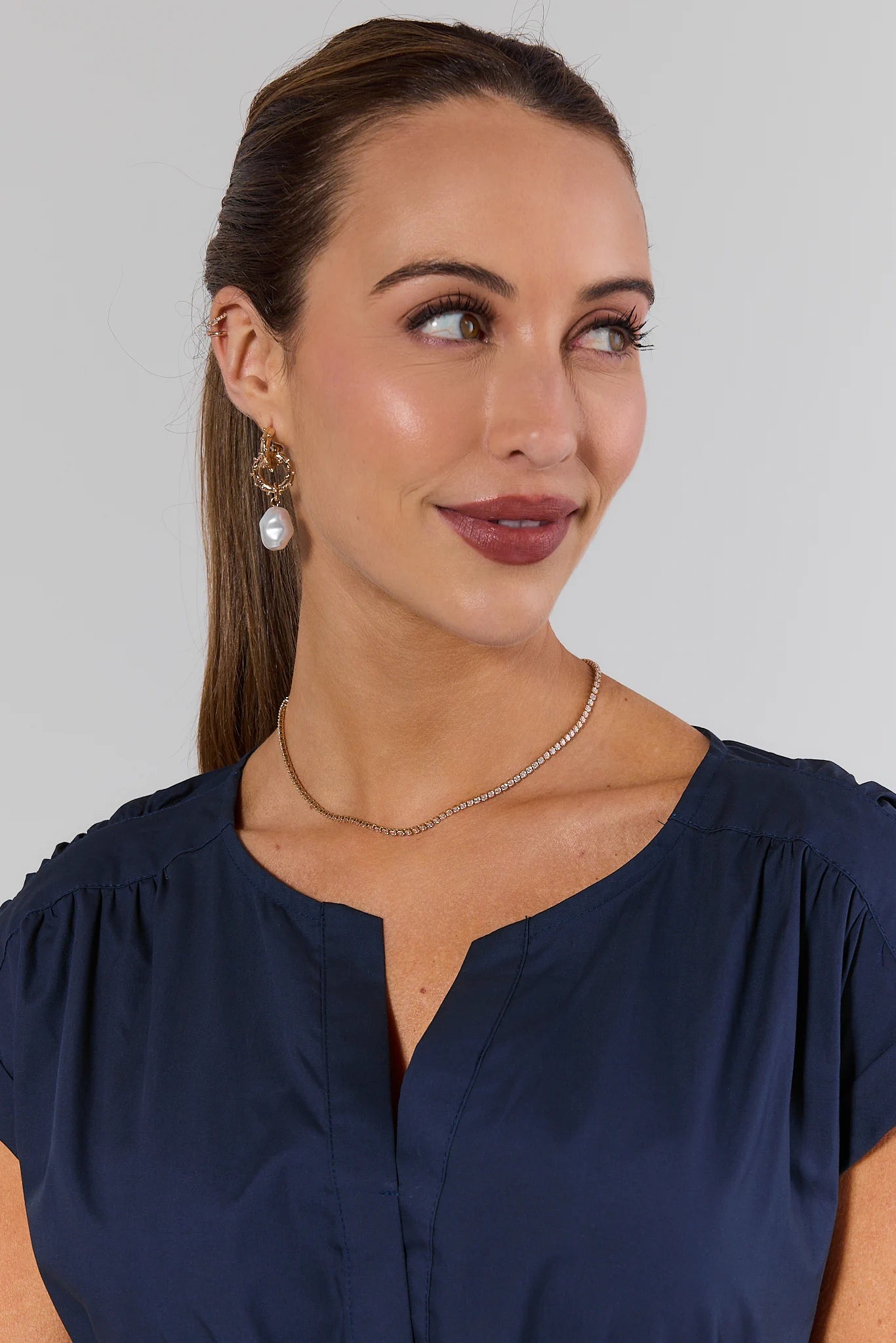 woman wearing Gold Tennis Necklace