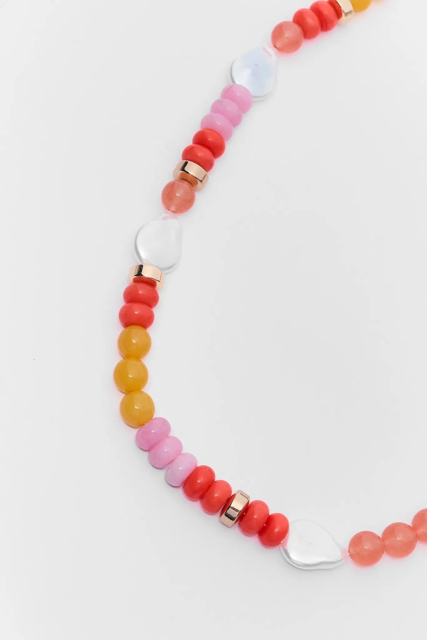 close up Colorful beaded necklace on a white background