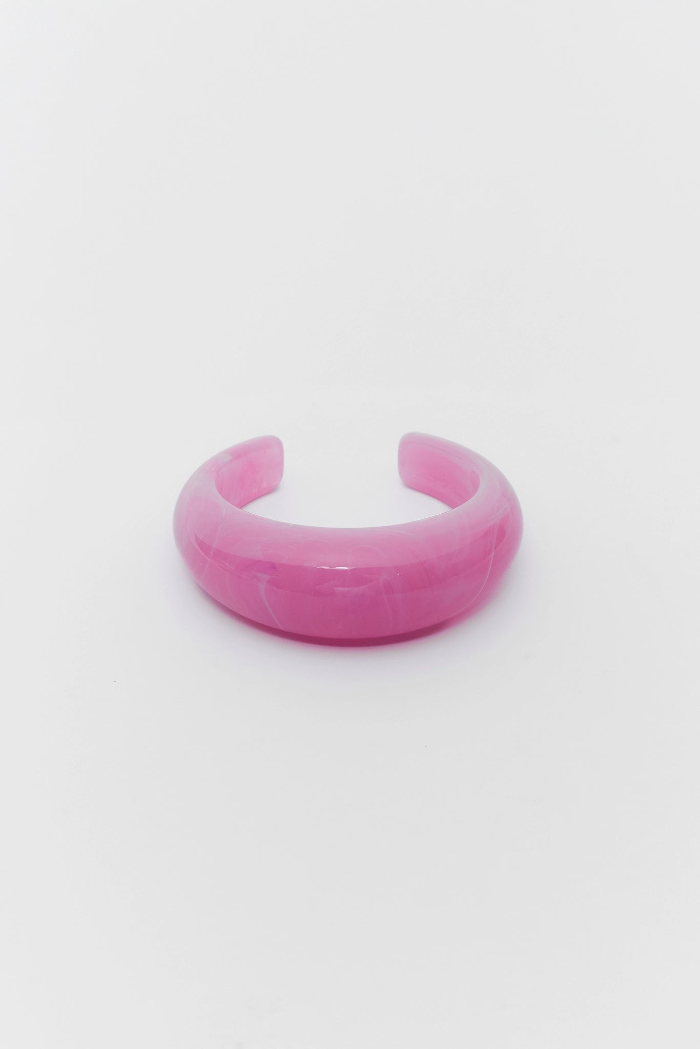 Pink bracelet on a white background