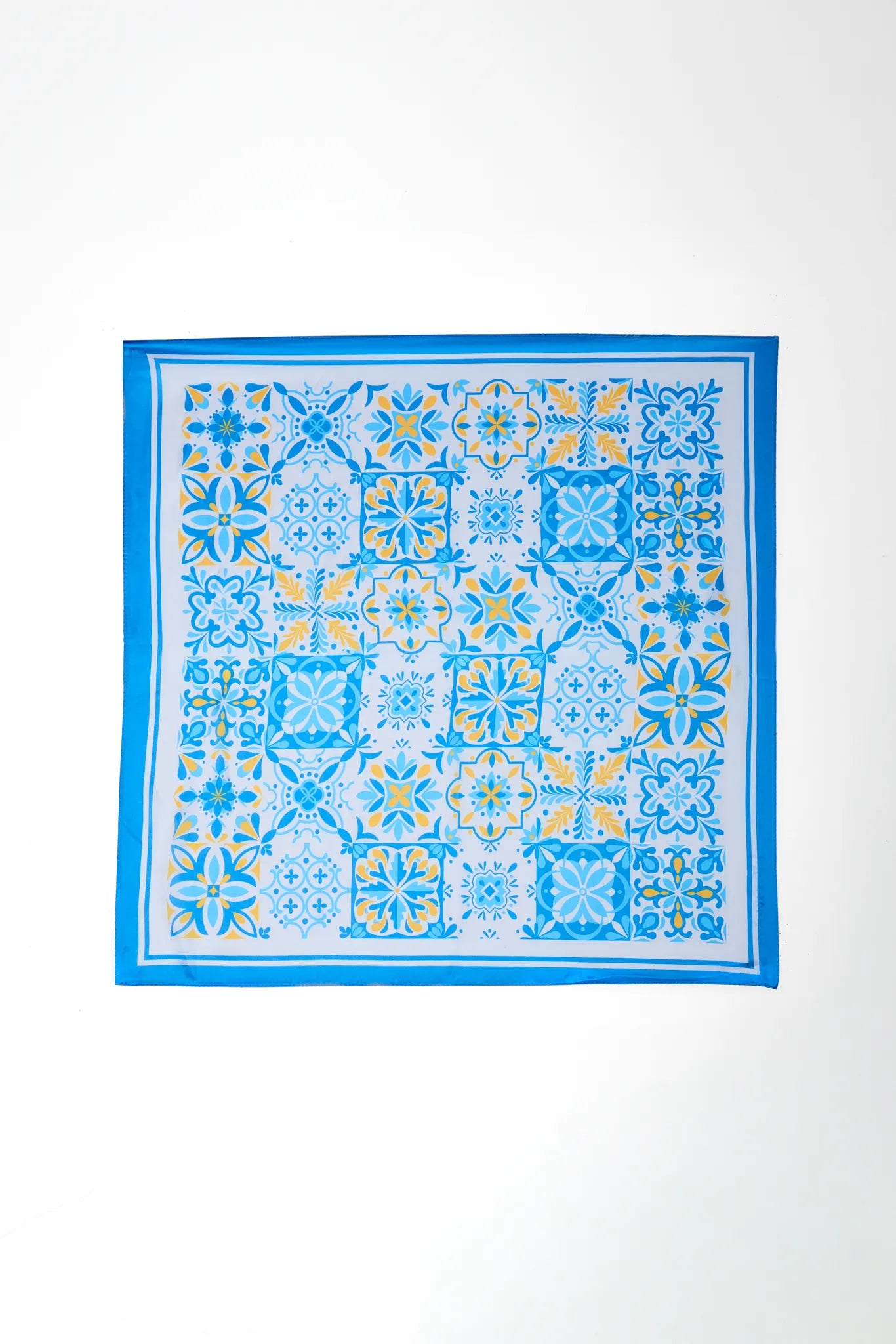 Blue patterned fabric scarf on a white background