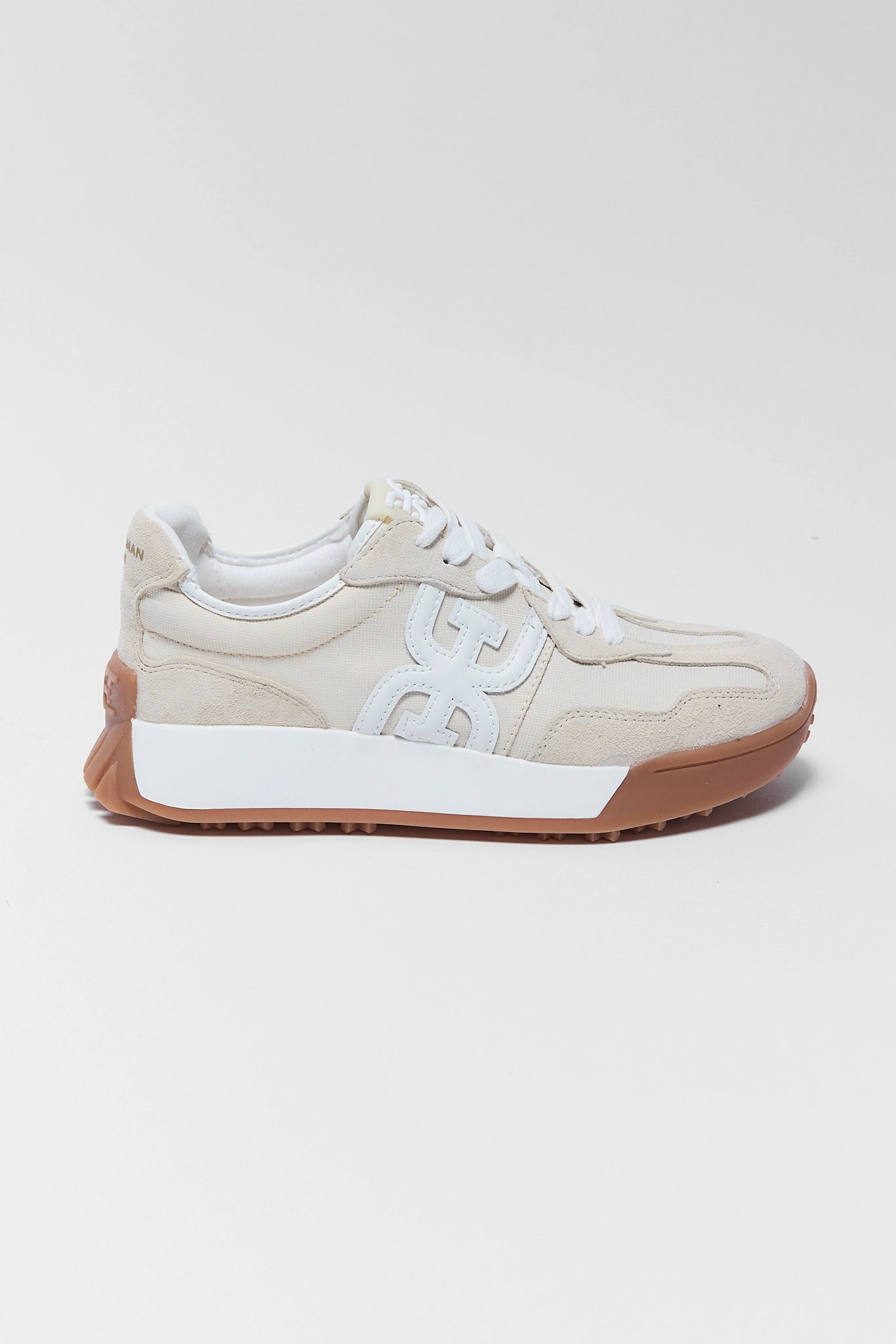 one langley ivory sneaker by sam edleman on white background