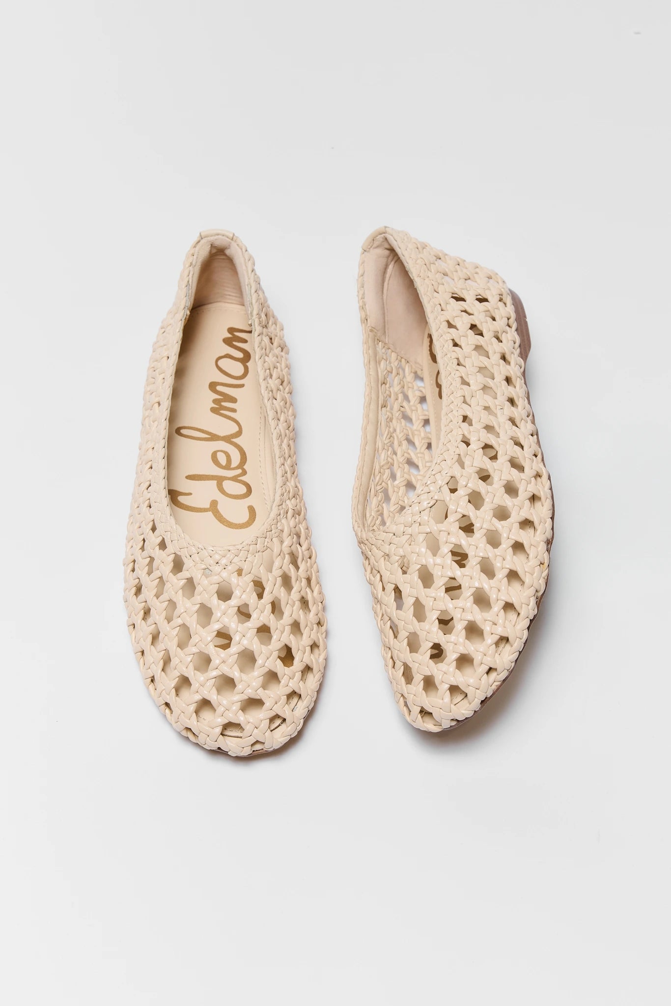 two Ivory Shira Woven Flats by Sam Edelman on white background