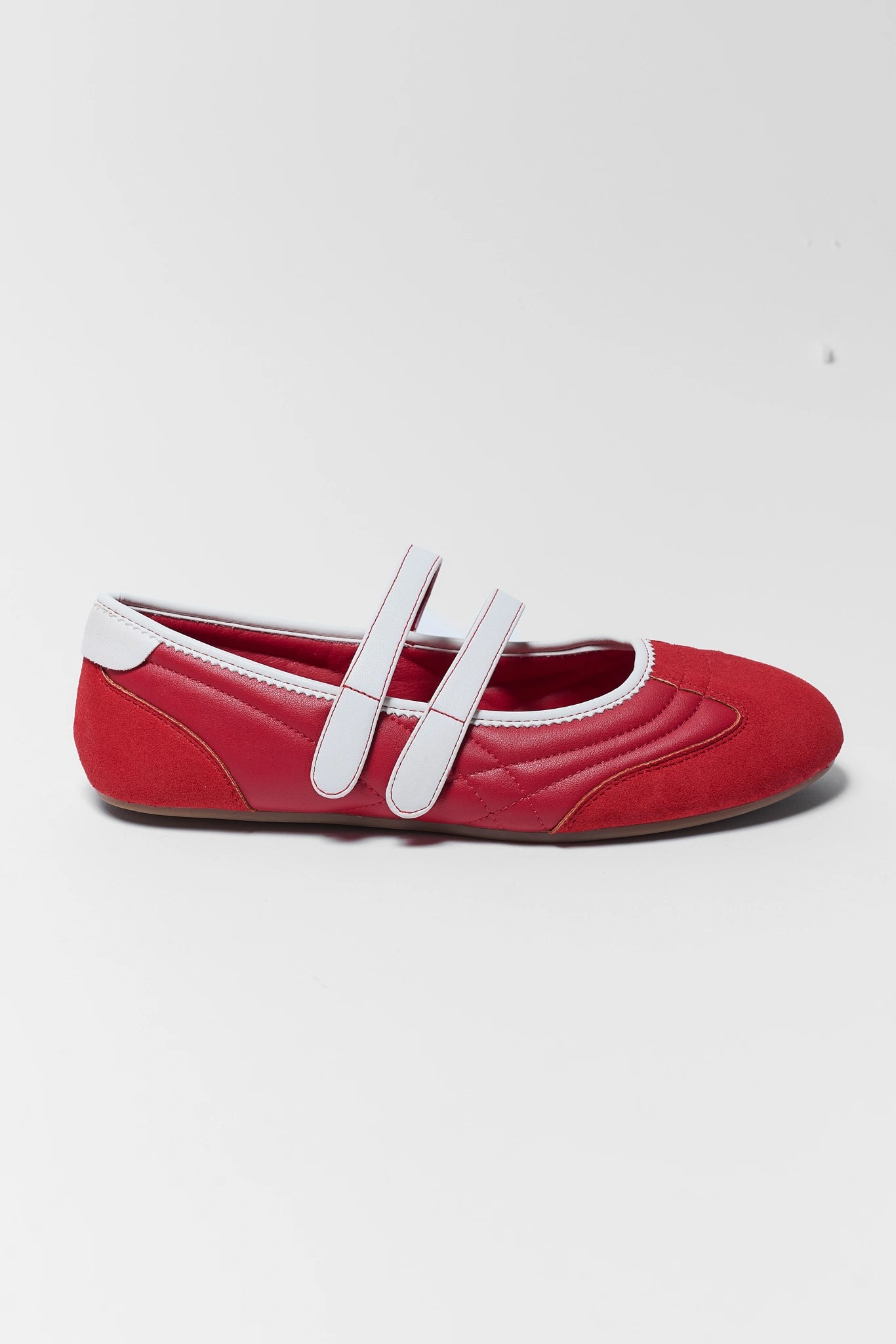 one red flat sneakers