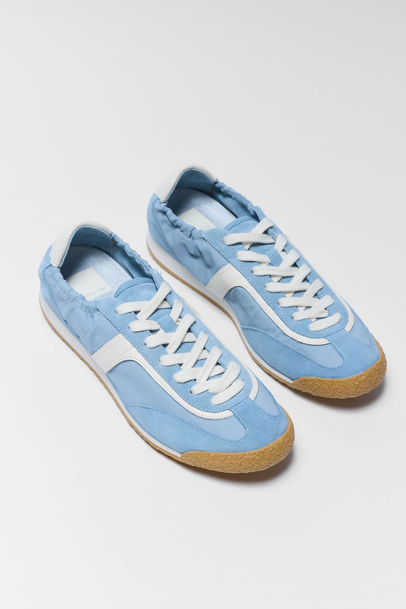 two blue Dolce Vita sneakers