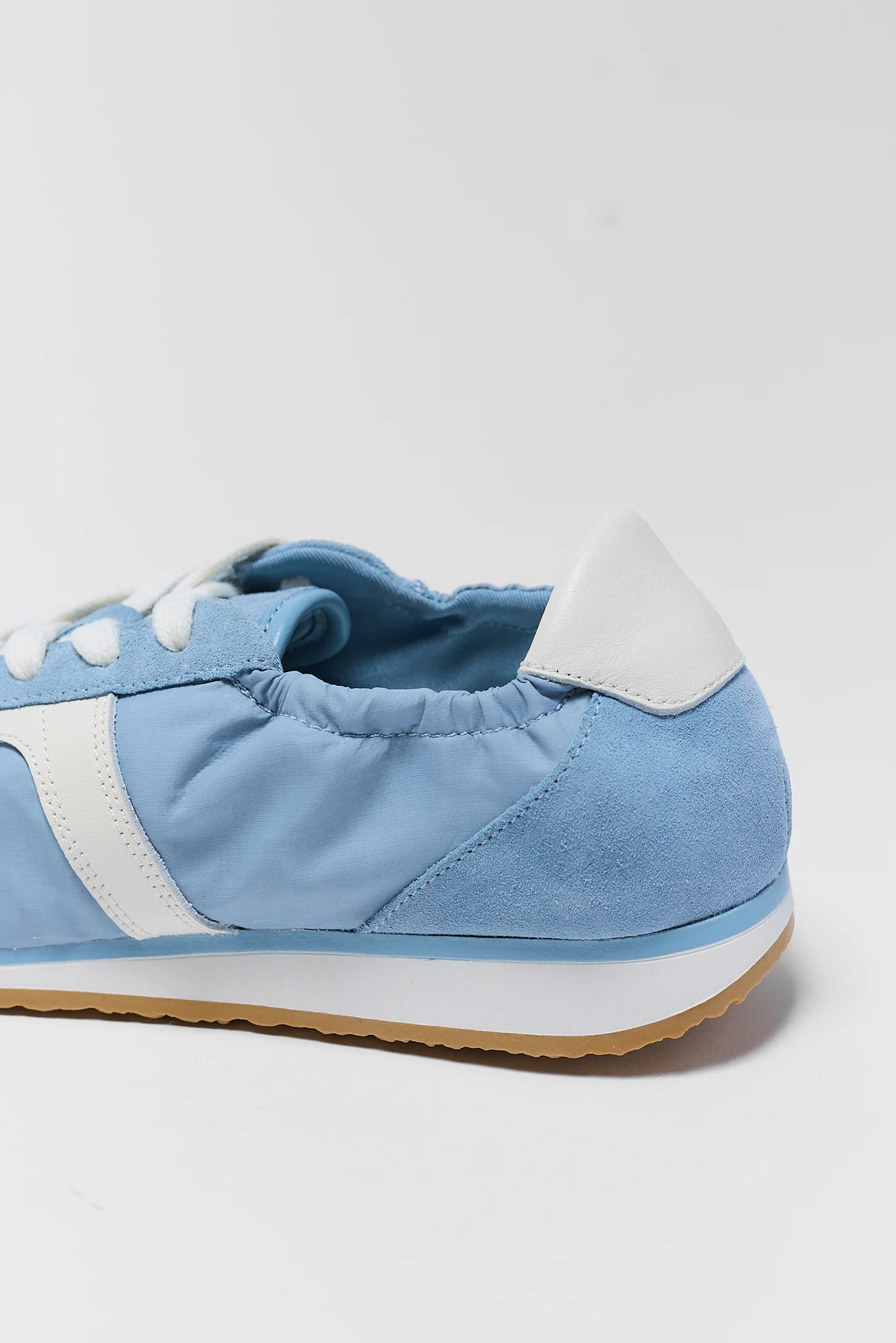 close up of blue Dolce Vita sneaker