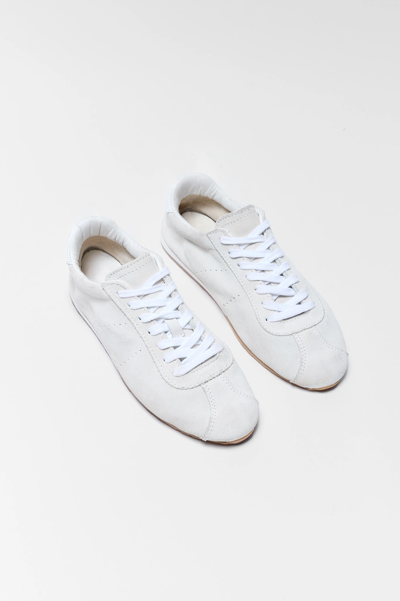 Serina Ivory Sneakers by Dolce Vita