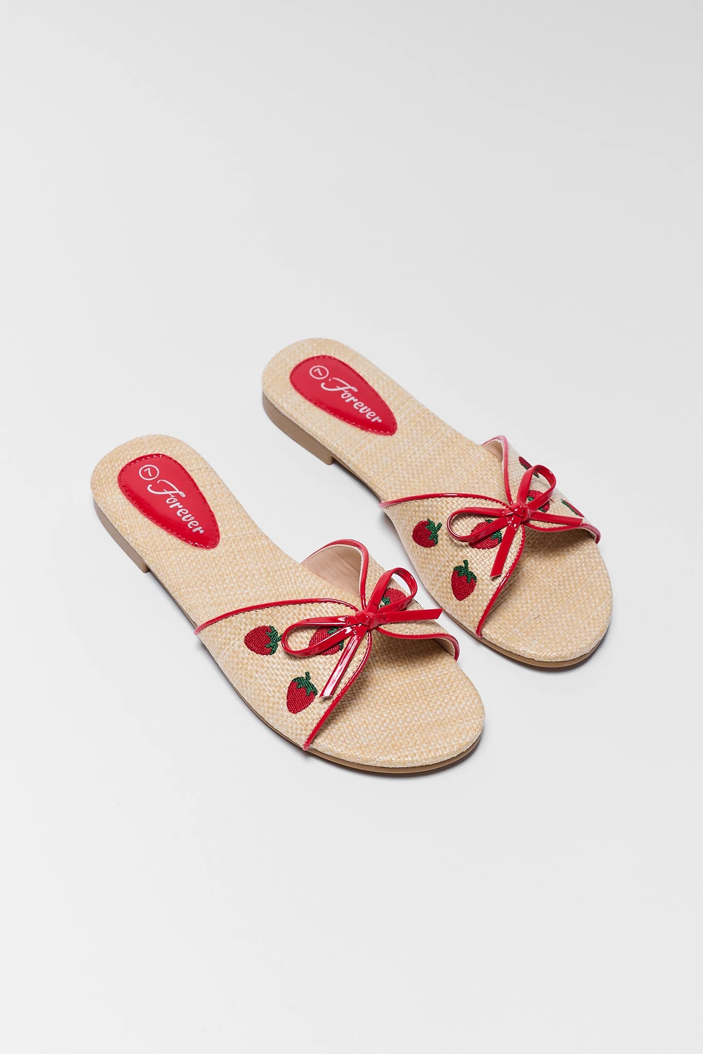 Tan Raffia Strawberry Sandals on white background